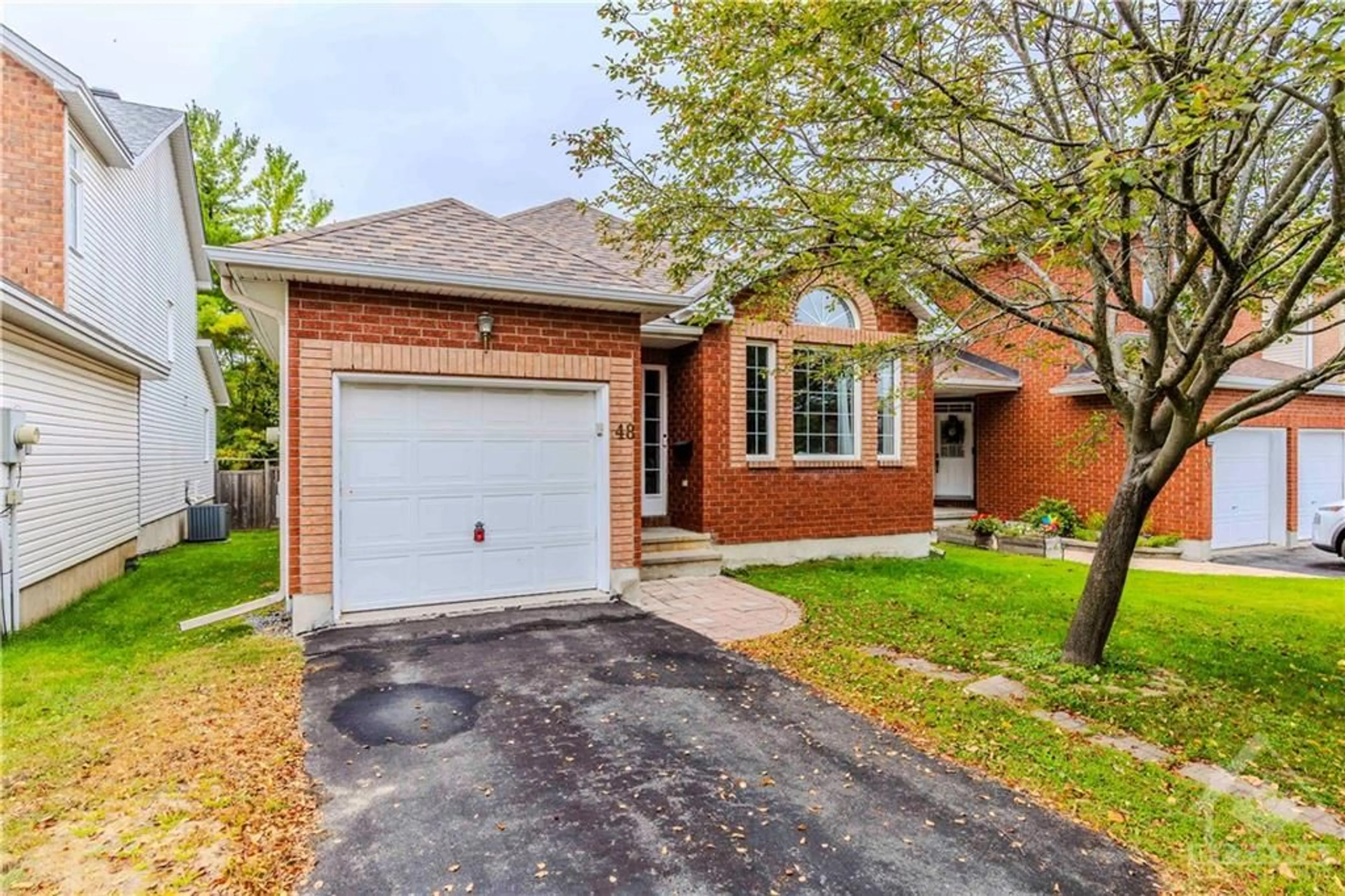 Home with brick exterior material for 48 MARICONA Way, Ottawa Ontario K2T 1H2