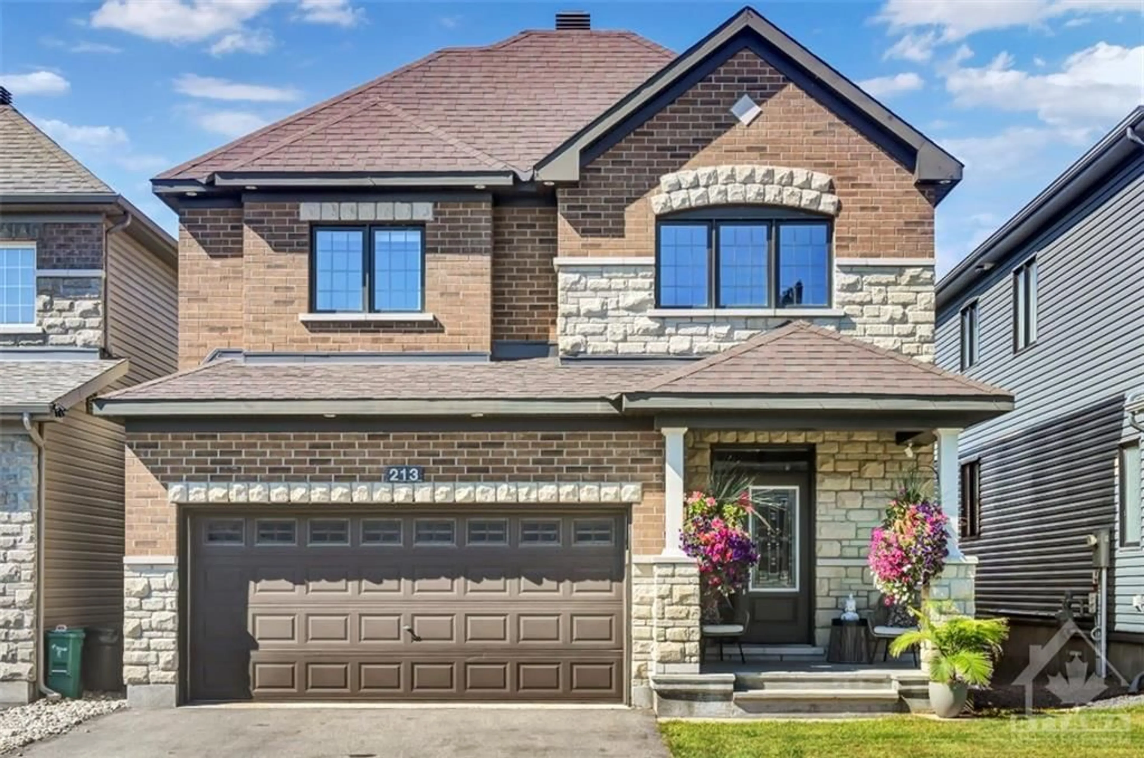 Home with brick exterior material for 213 ENCLAVE Walk, Ottawa Ontario K1W 0J4