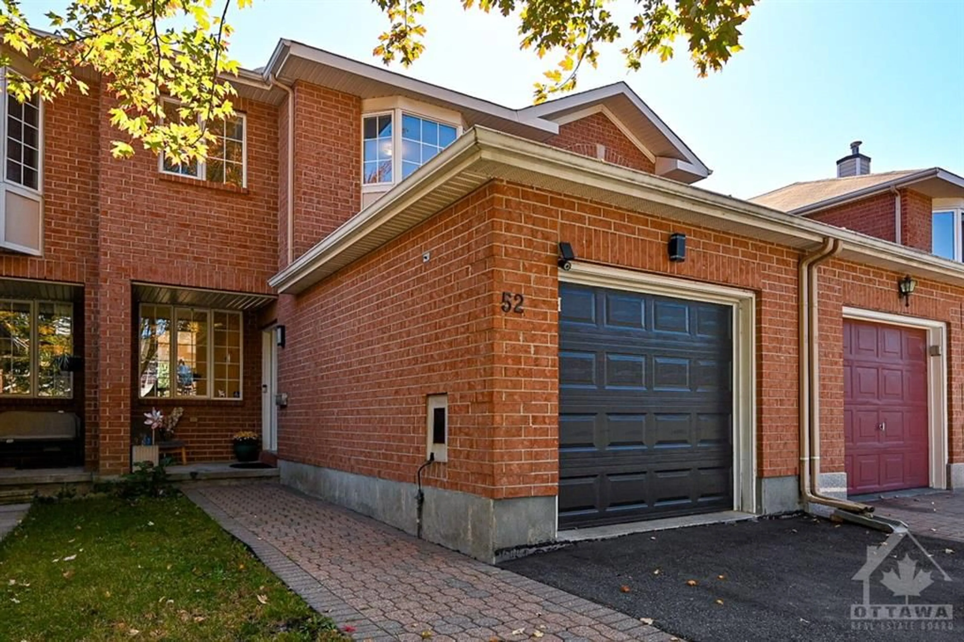 Home with brick exterior material for 52 DAVENTRY Cres, Barrhaven Ontario K2J 4M8