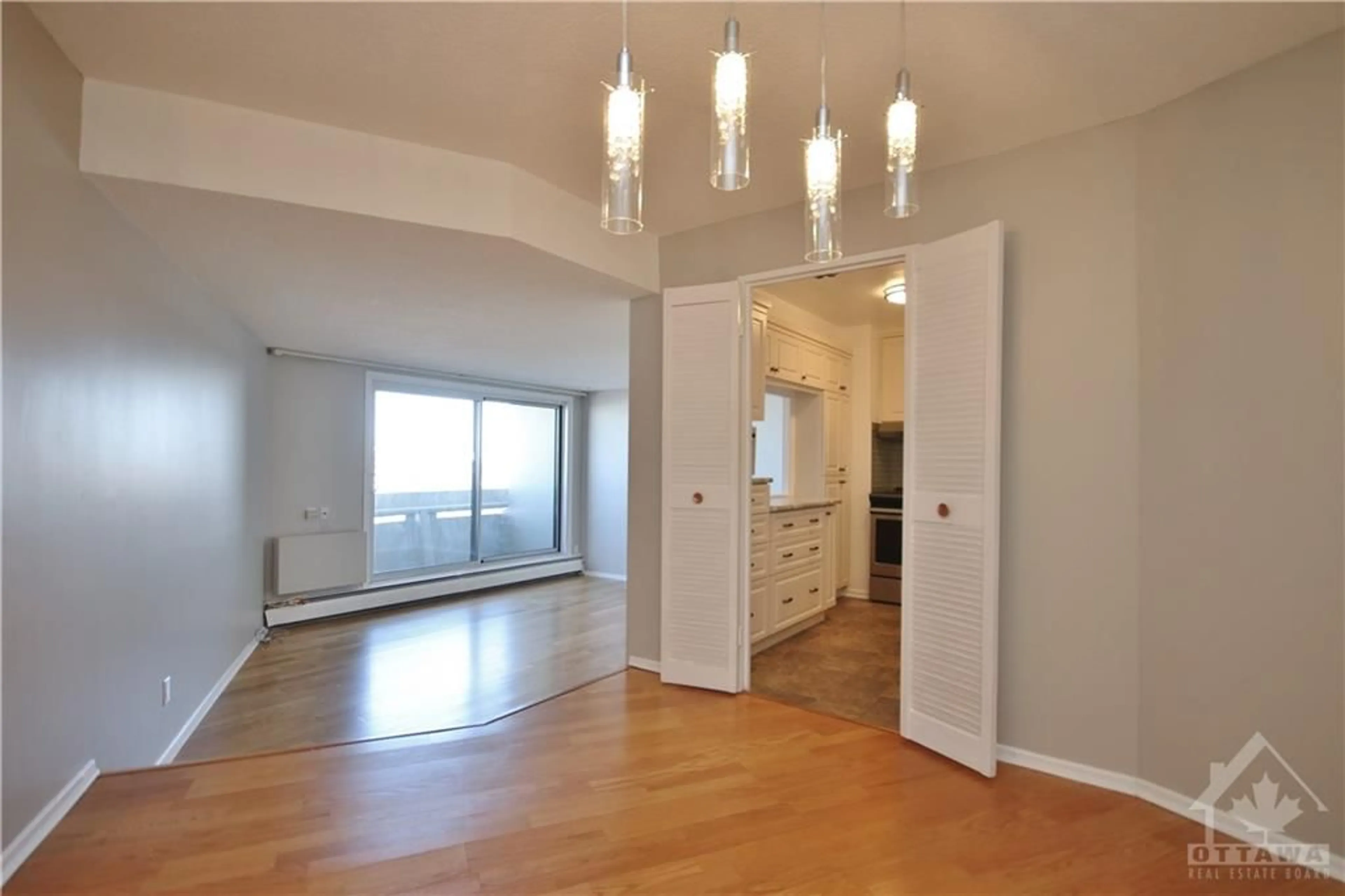 A pic of a room, wood floors for 1171 AMBLESIDE Dr #1012, Ottawa Ontario K2B 8E1