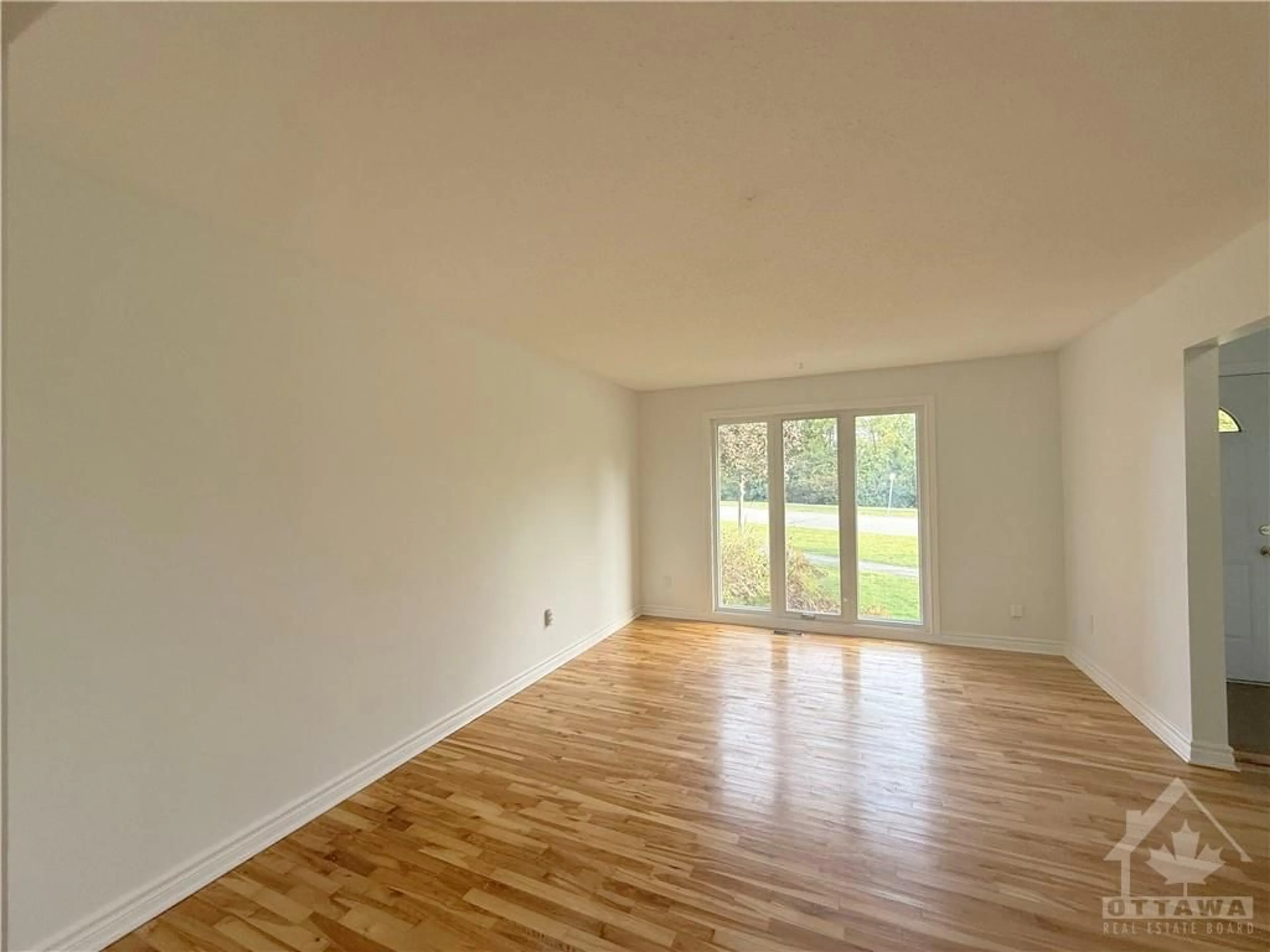 A pic of a room, wood floors for 1900 MARQUIS Ave #13, Ottawa Ontario K1J 8J2