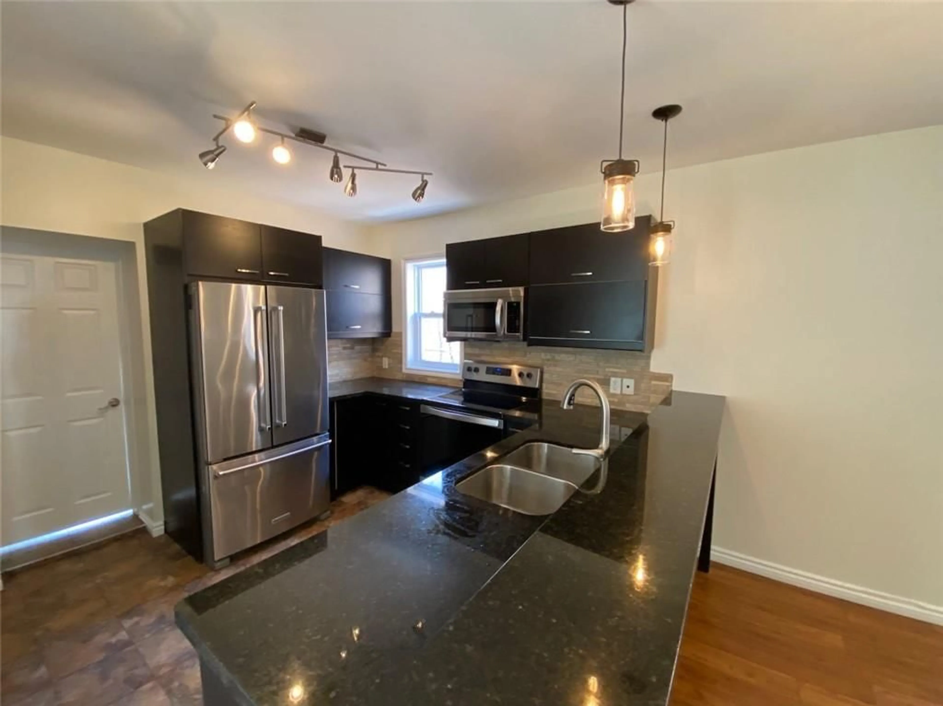 Open concept kitchen for 198 LAUDER Ave, Toronto Ontario M6E 3H4