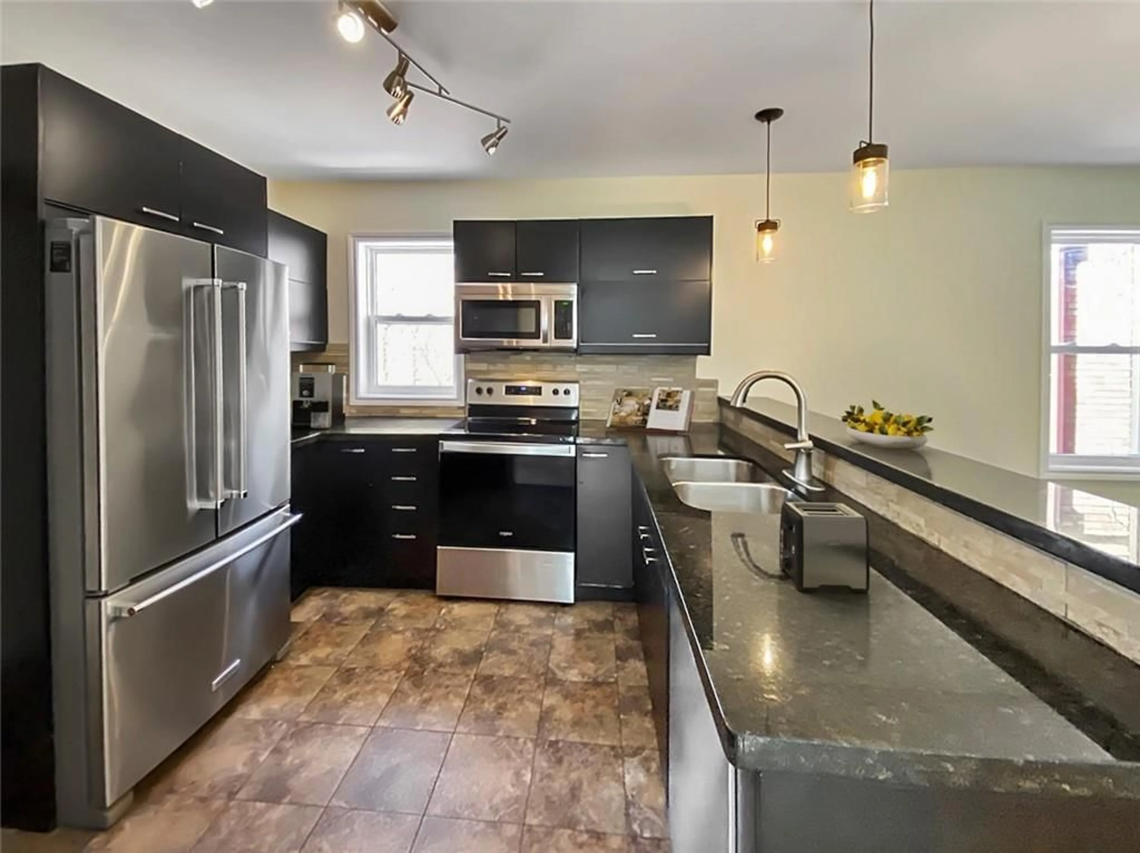 Contemporary kitchen, wood floors for 198 LAUDER Ave, Toronto Ontario M6E 3H4