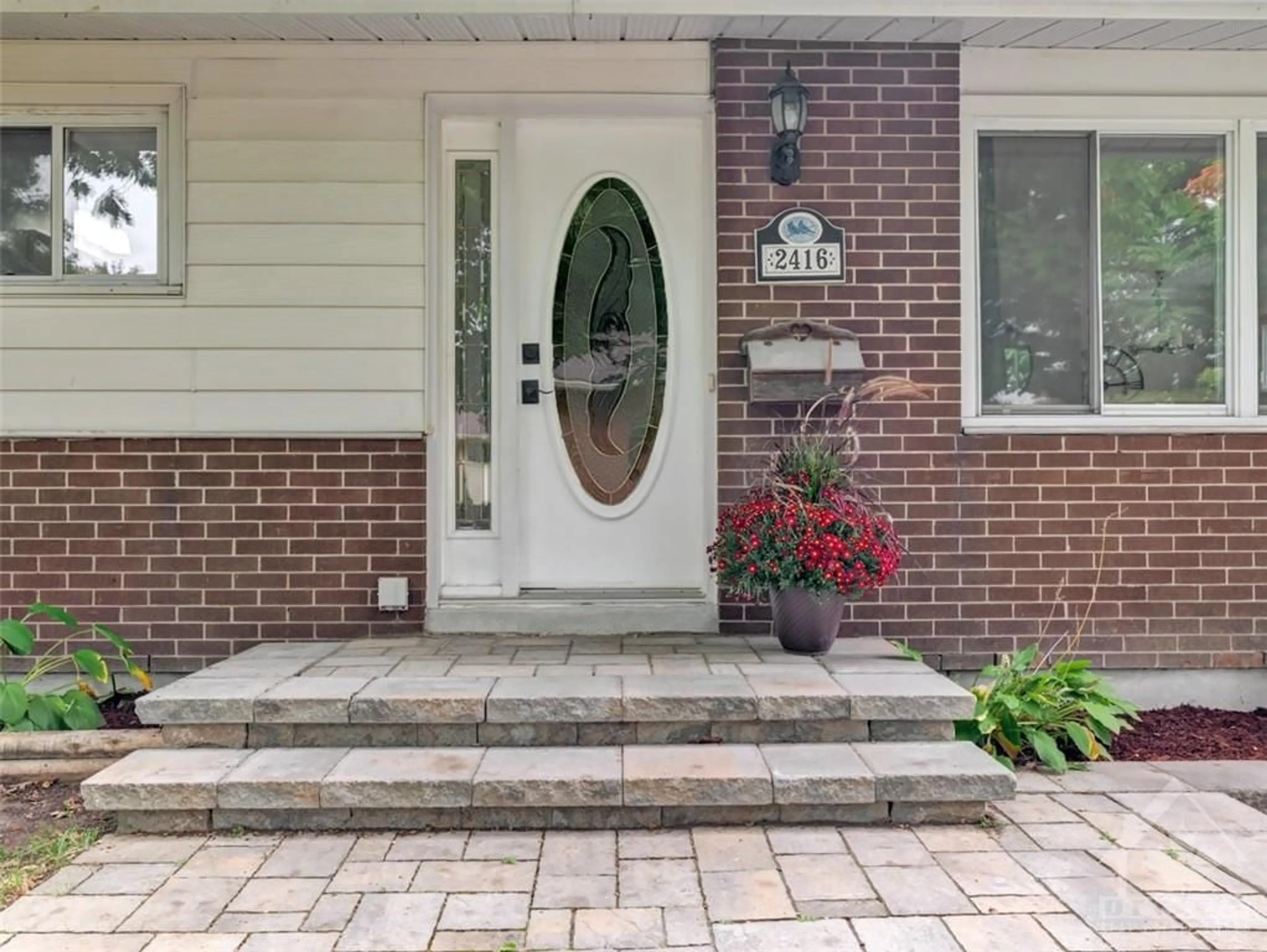 Home with brick exterior material for 2416 HOWLAND Ave, Ottawa Ontario K1G 1J5