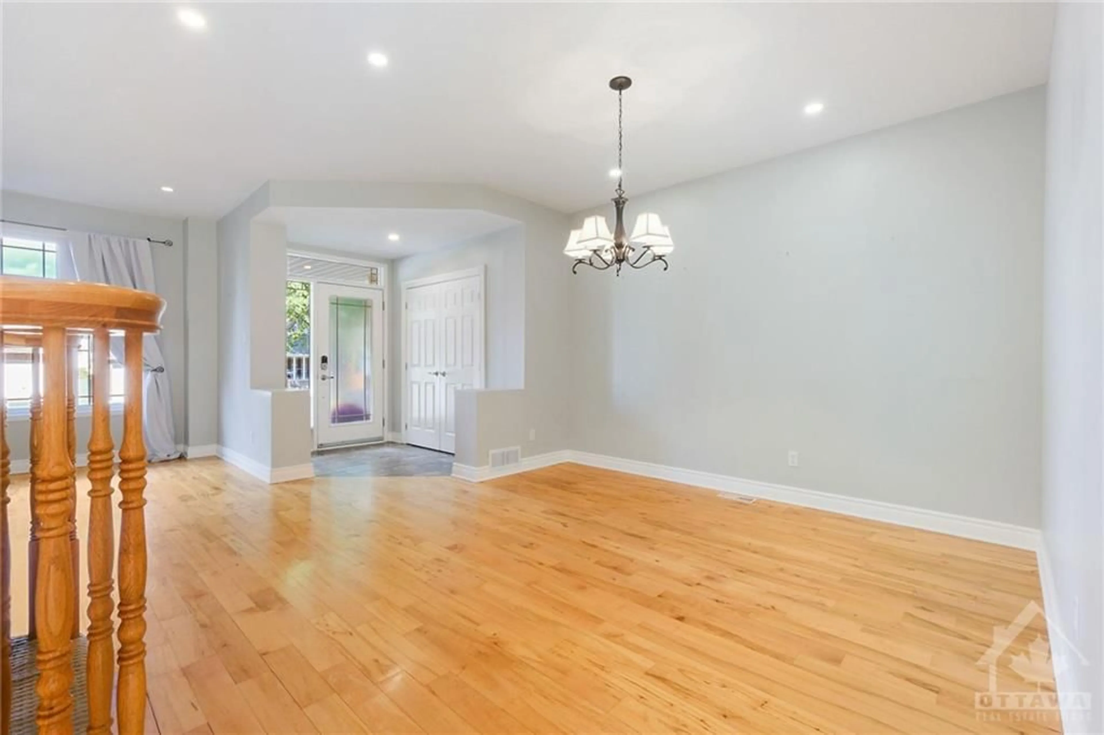 A pic of a room, wood floors for 48 PORTADOWN Cres, Ottawa Ontario K2W 1E8