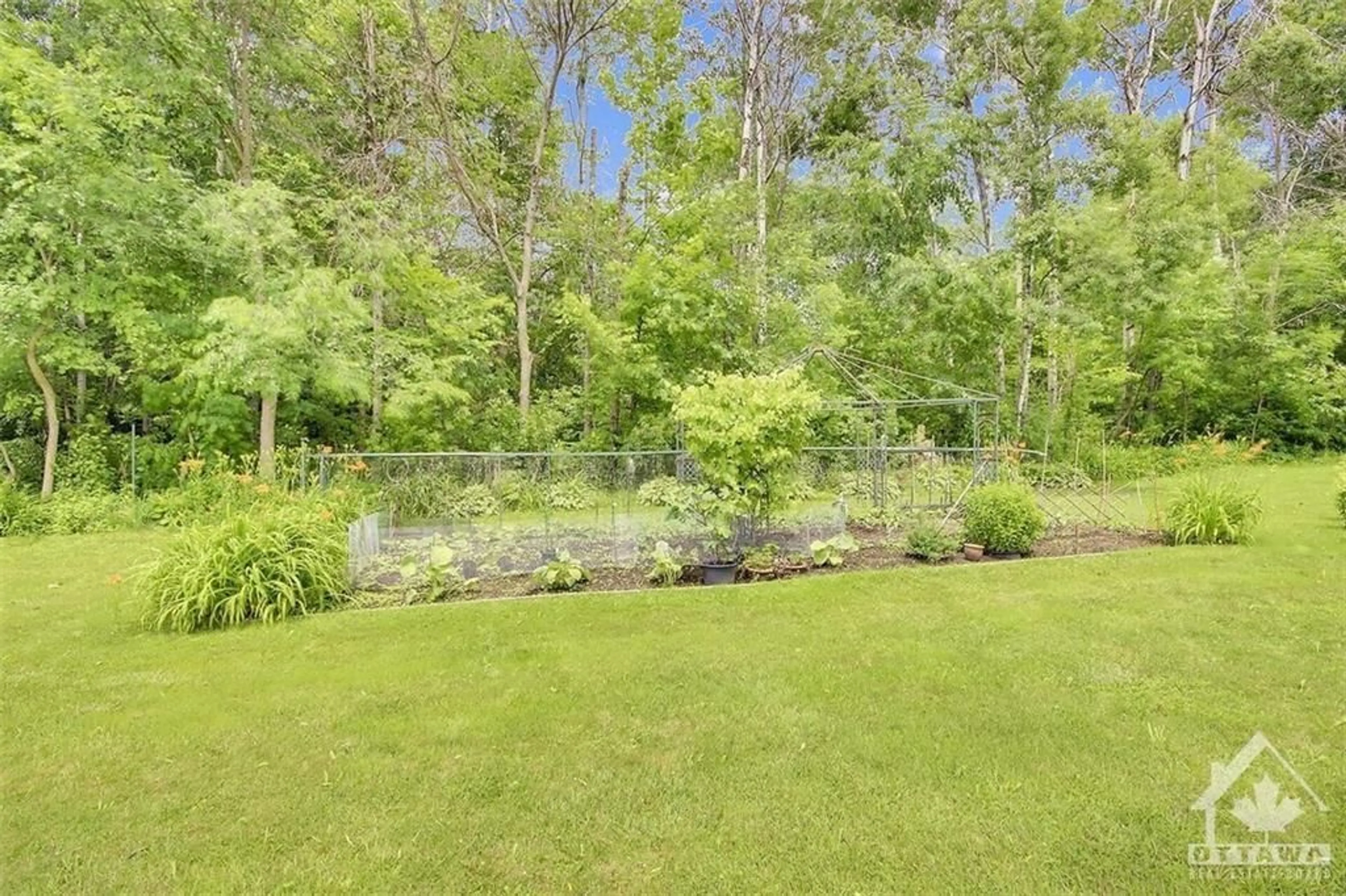 Patio, the fenced backyard for 6219 ELKWOOD Dr, Ottawa Ontario K4P 1N1