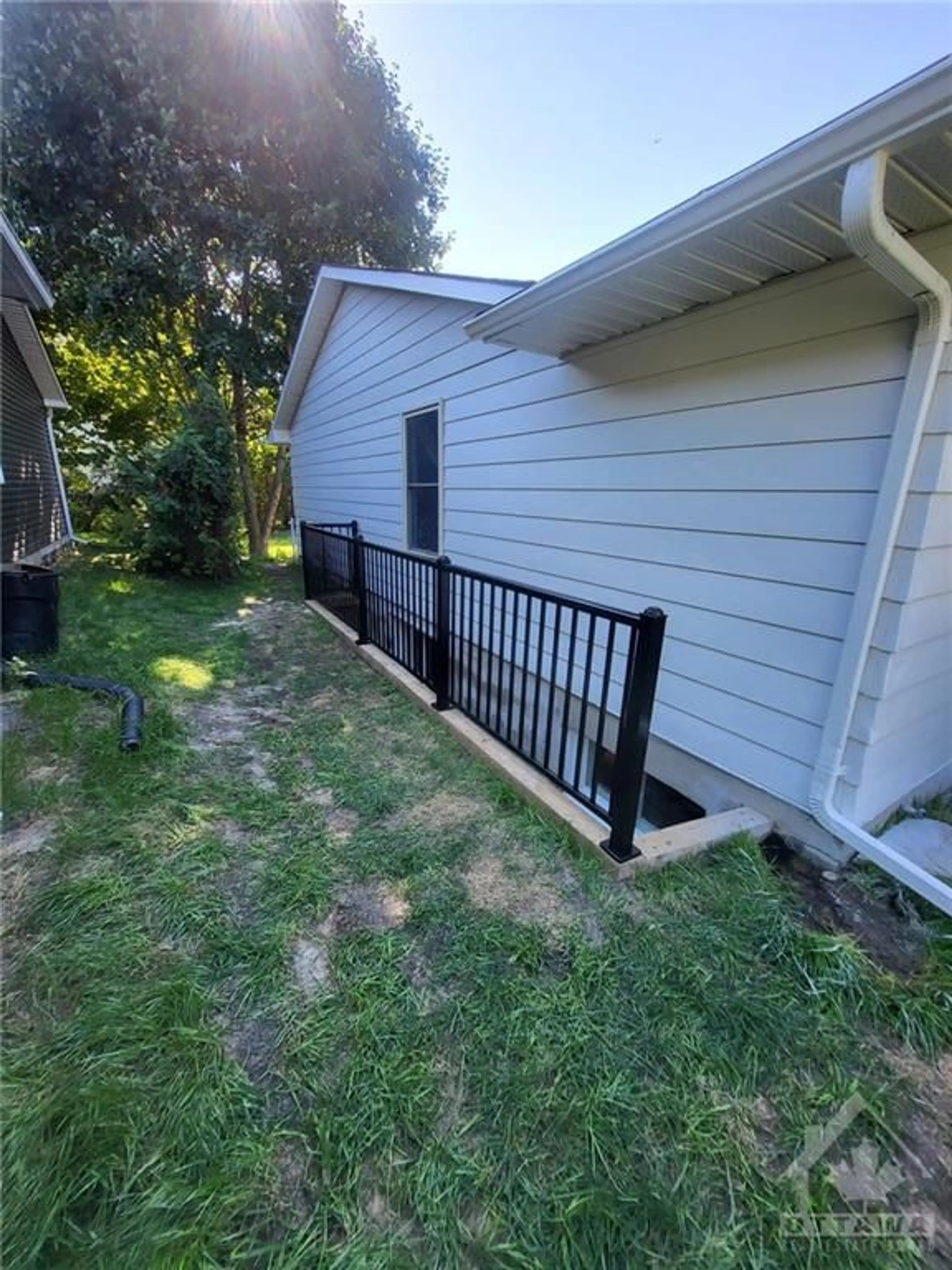 Frontside or backside of a home, the fenced backyard for 3336 KODIAK St, Ottawa Ontario K1V 7S8