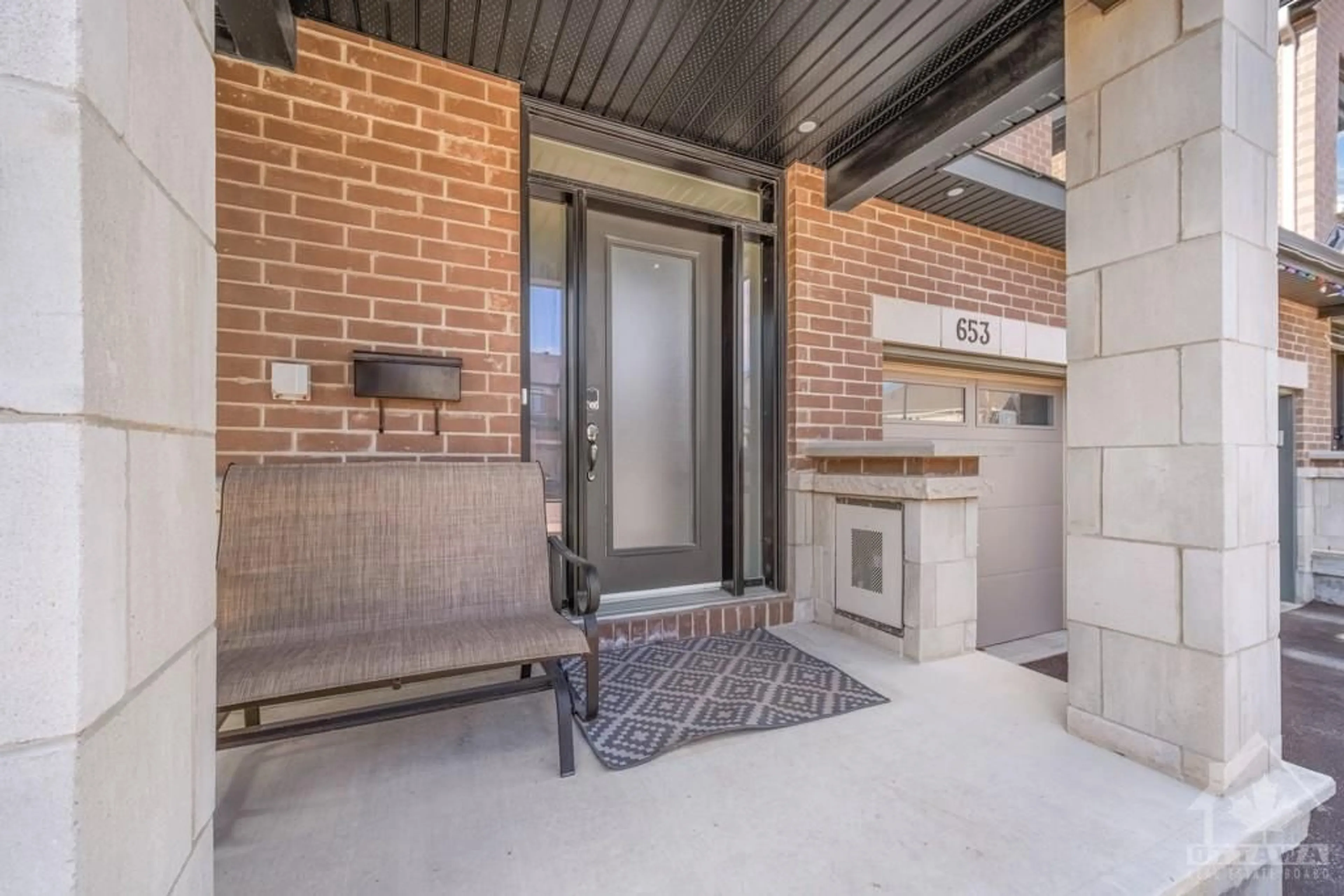 Indoor entryway, cement floor for 653 PUTNEY Cres, Ottawa Ontario K2S 2N7