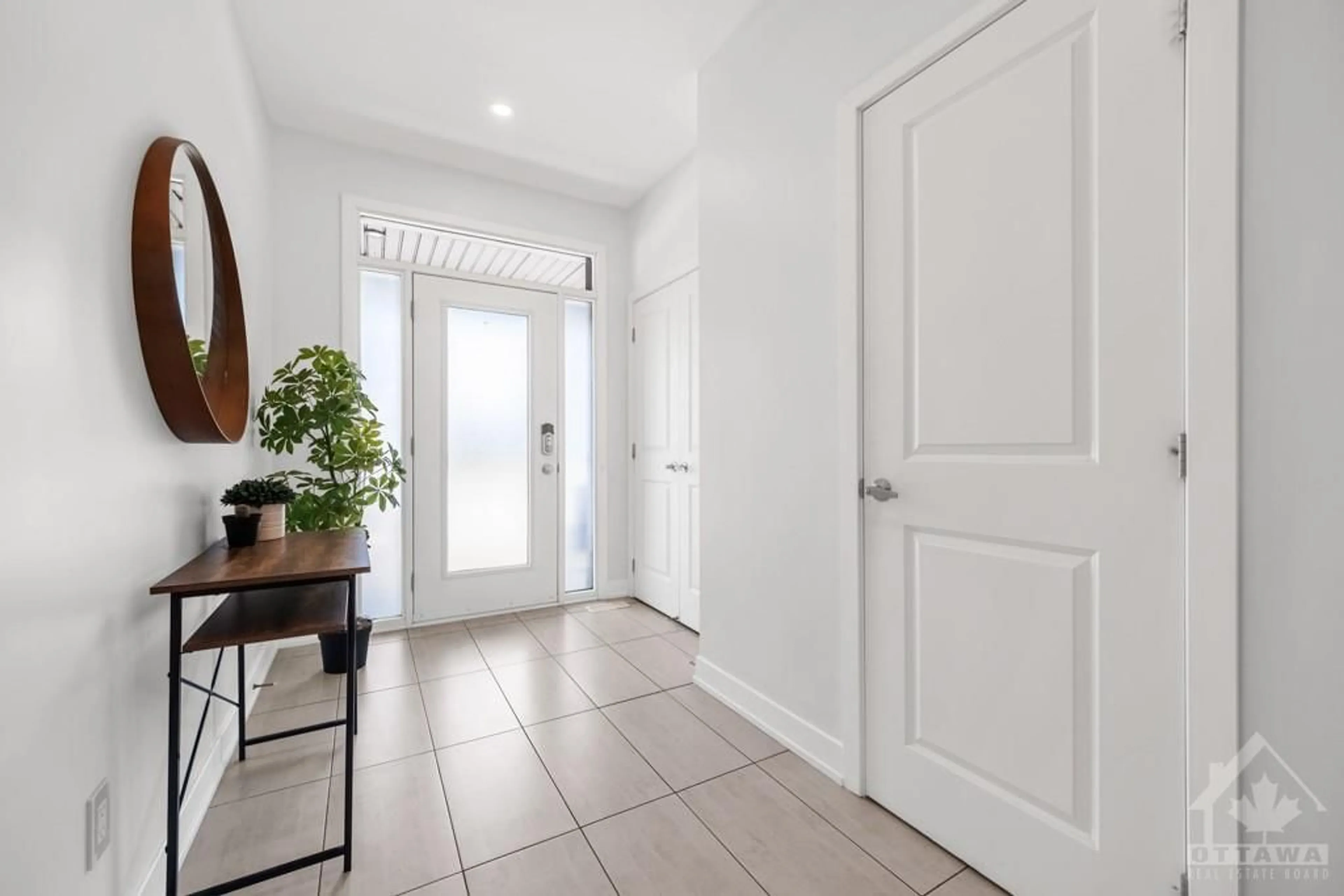 Indoor entryway, wood floors for 653 PUTNEY Cres, Ottawa Ontario K2S 2N7