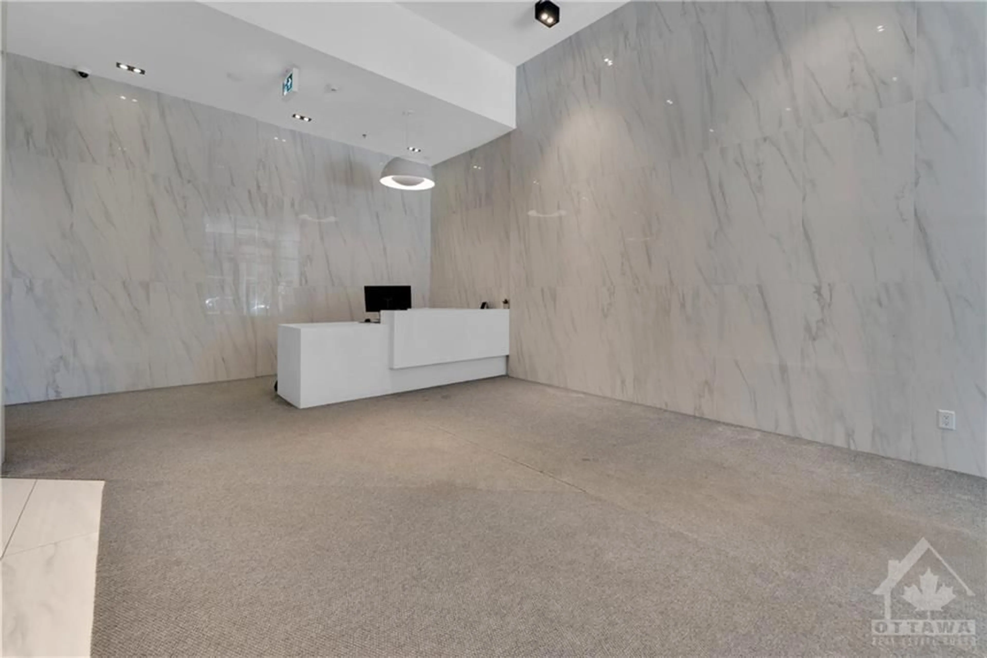 Indoor lobby, cement floor for 203 CATHERINE St #1701, Ottawa Ontario K2P 1J5