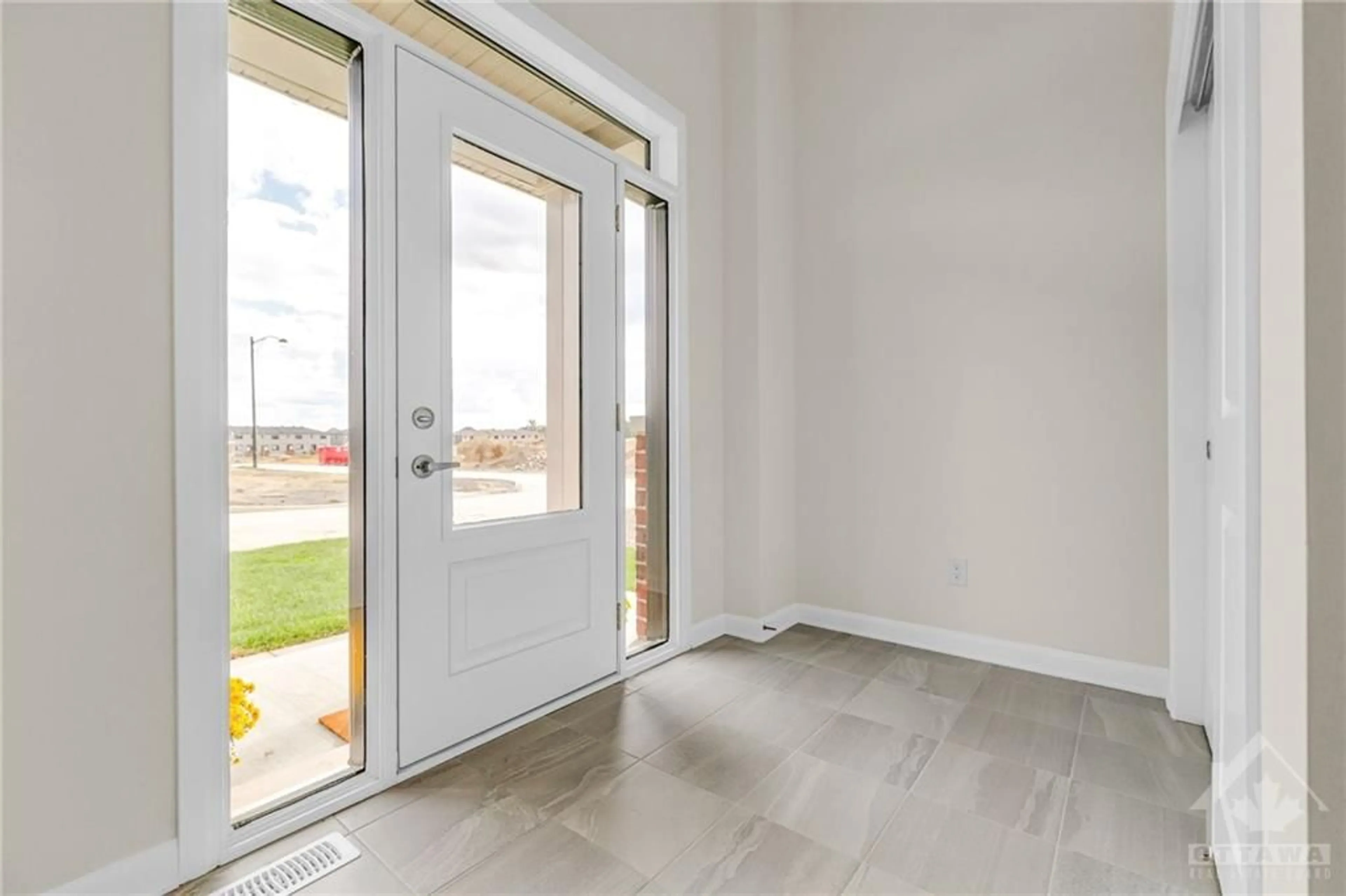 Indoor entryway, cement floor for 201 ELSIE MACGILL Walk, Ottawa Ontario K2W 0L5