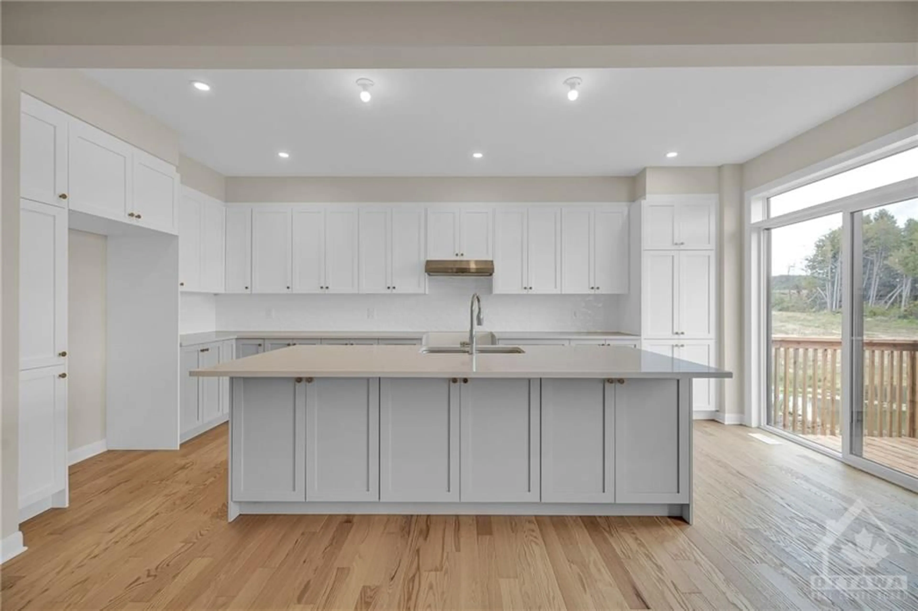 Open concept kitchen for 201 ELSIE MACGILL Walk, Ottawa Ontario K2W 0L5