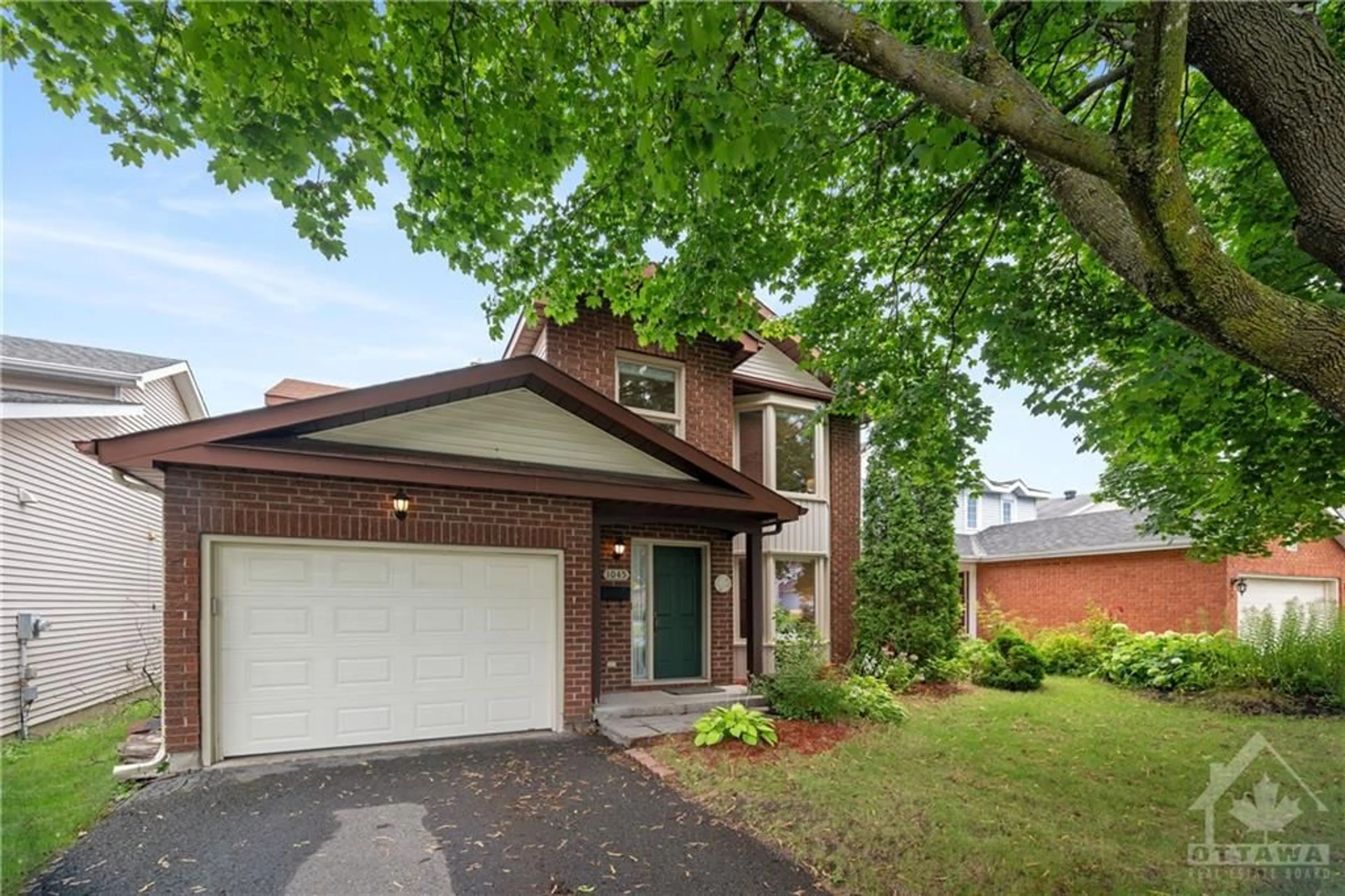 Home with brick exterior material for 1045 KARSH Dr, Ottawa Ontario K1R 7W2