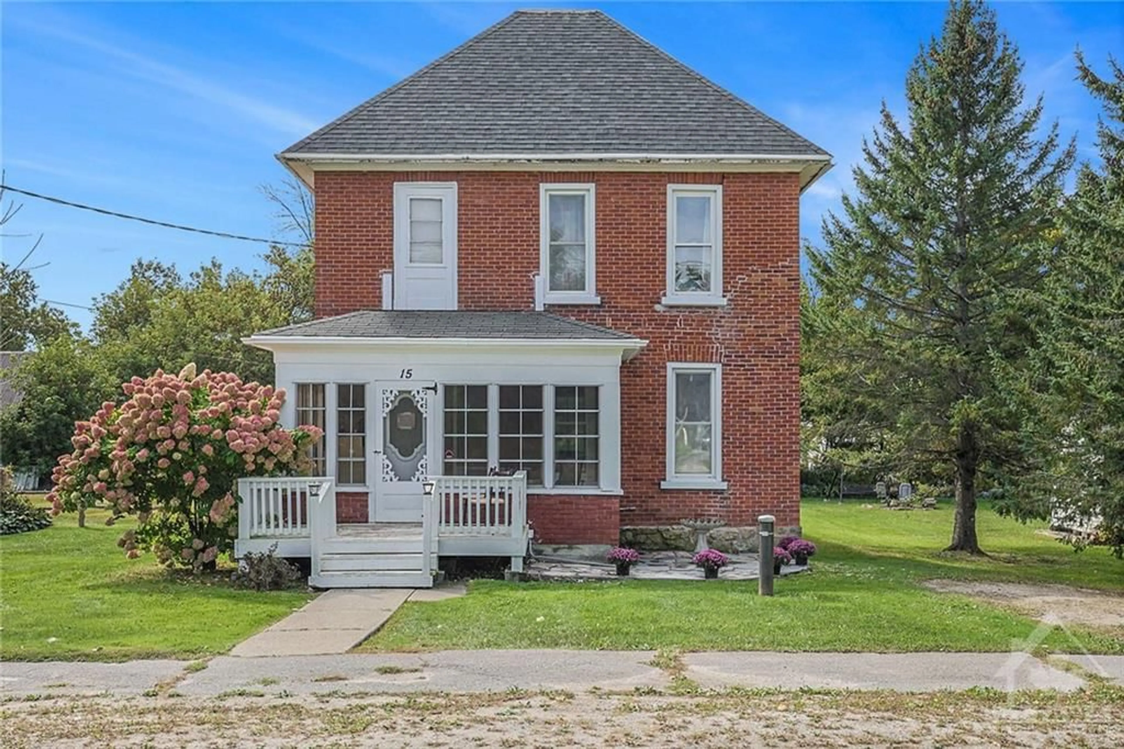 Home with brick exterior material for 15 CARLETON St, Newboro Ontario K0G 1P0