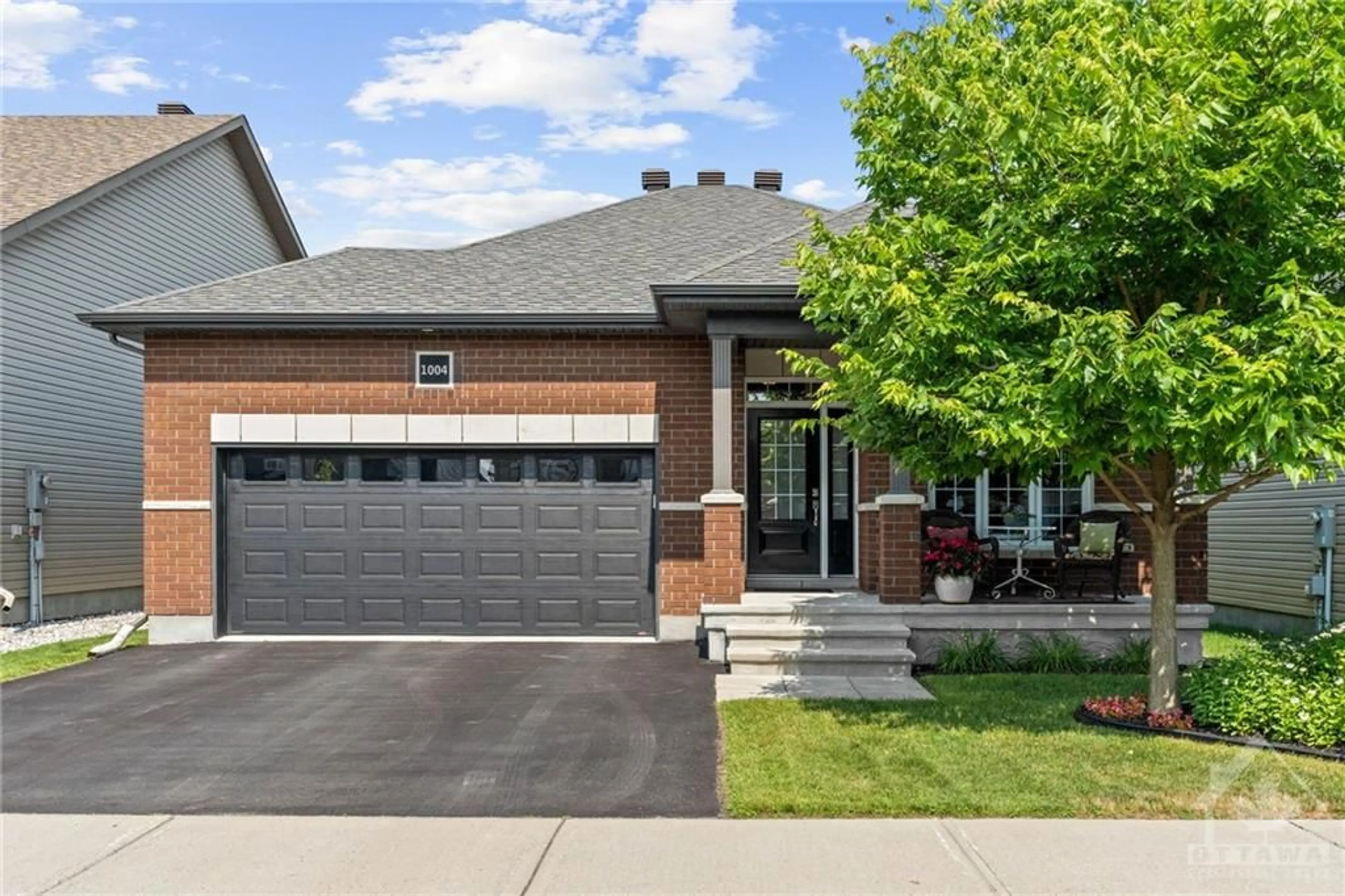 Home with brick exterior material for 1004 ROTARY Way, Ottawa Ontario K1T 0M2