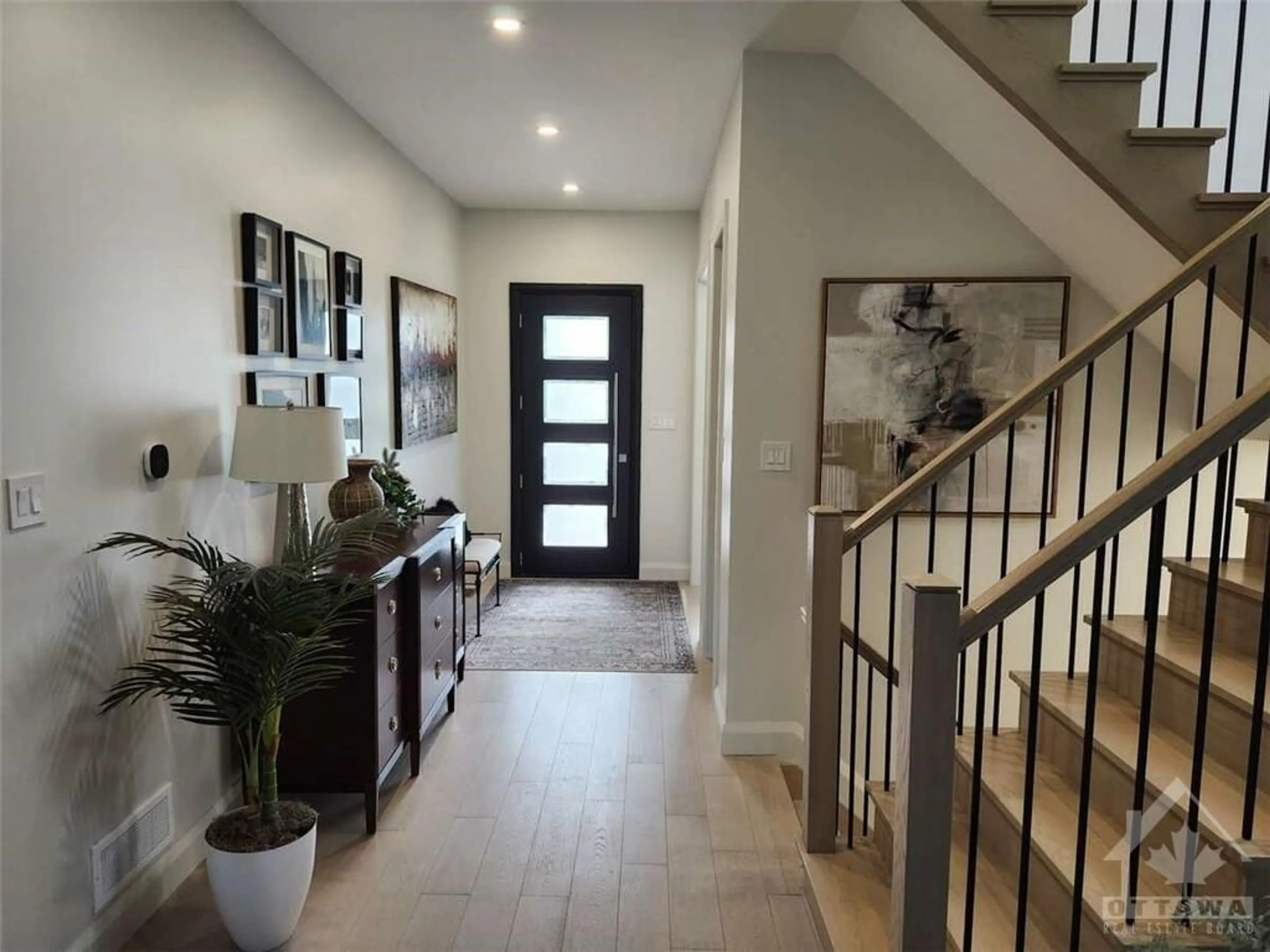 Indoor entryway, wood floors for 1754 PRINCE OF WALES Dr, Ottawa Ontario K2C 1P5