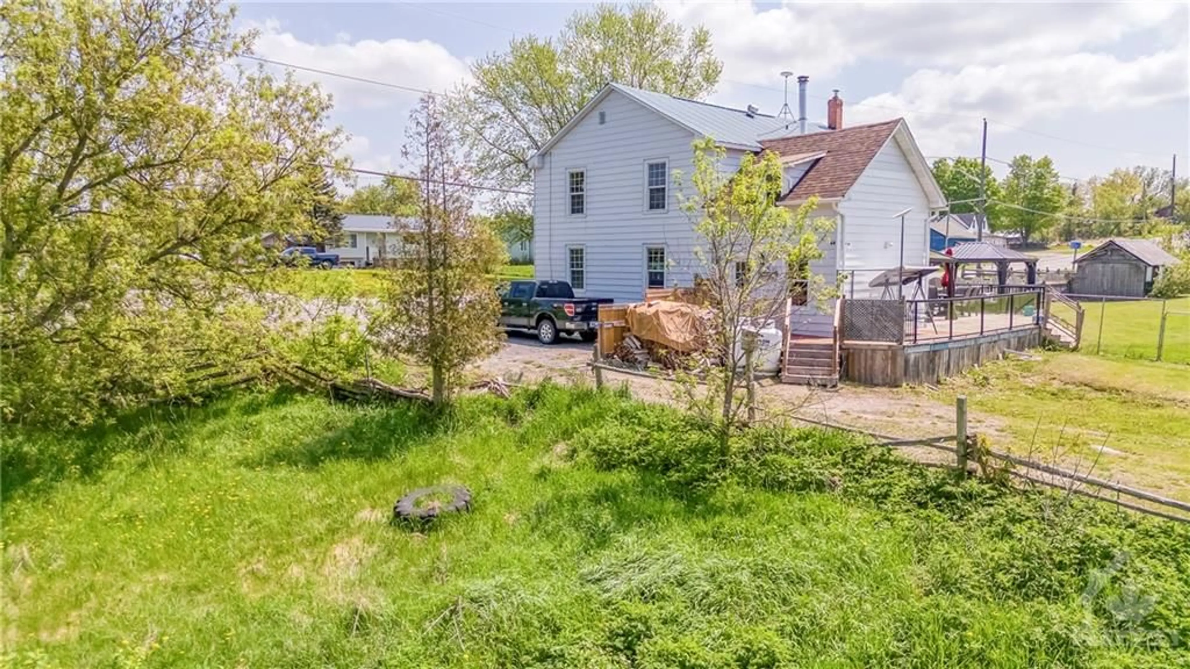 A pic from exterior of the house or condo, the fenced backyard for 5475 511 Hwy, Lanark Highlands Ontario K0A 1P0