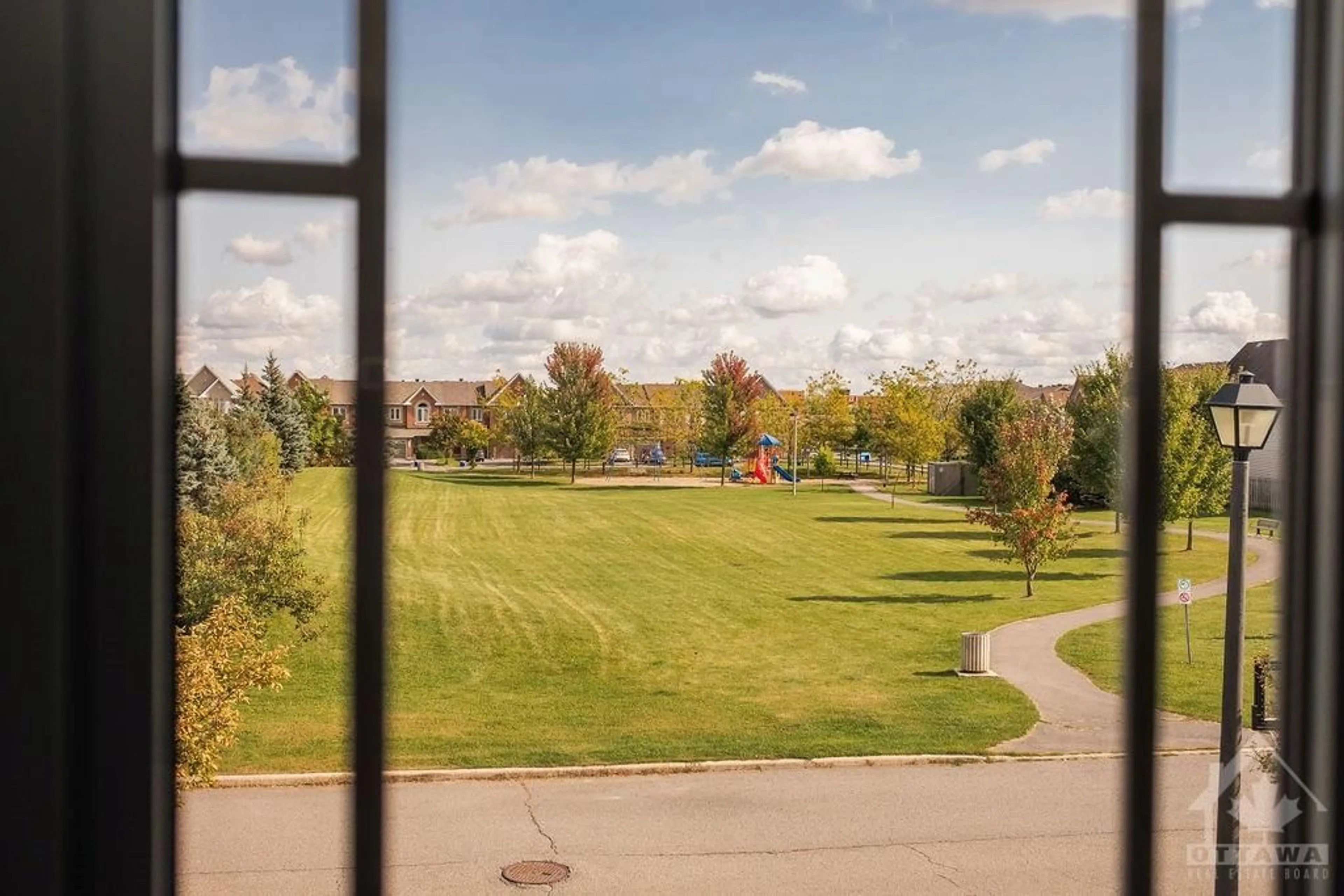 A pic from exterior of the house or condo, the fenced backyard for 429 SPARKMAN Ave, Ottawa Ontario K4A 0J1