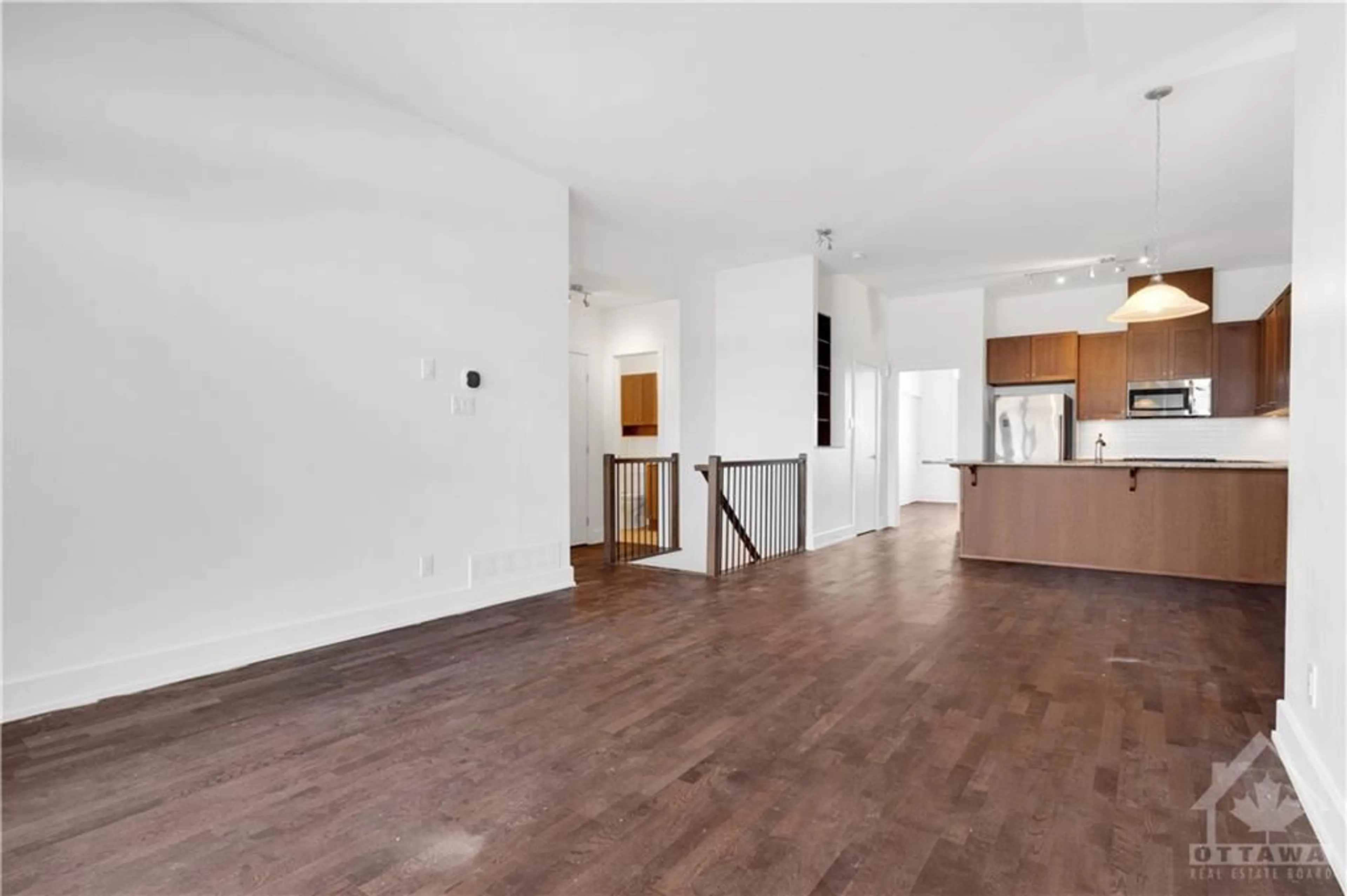 A pic of a room, wood floors for 42 BERGERON Pvt, Ottawa Ontario K1C 0C2