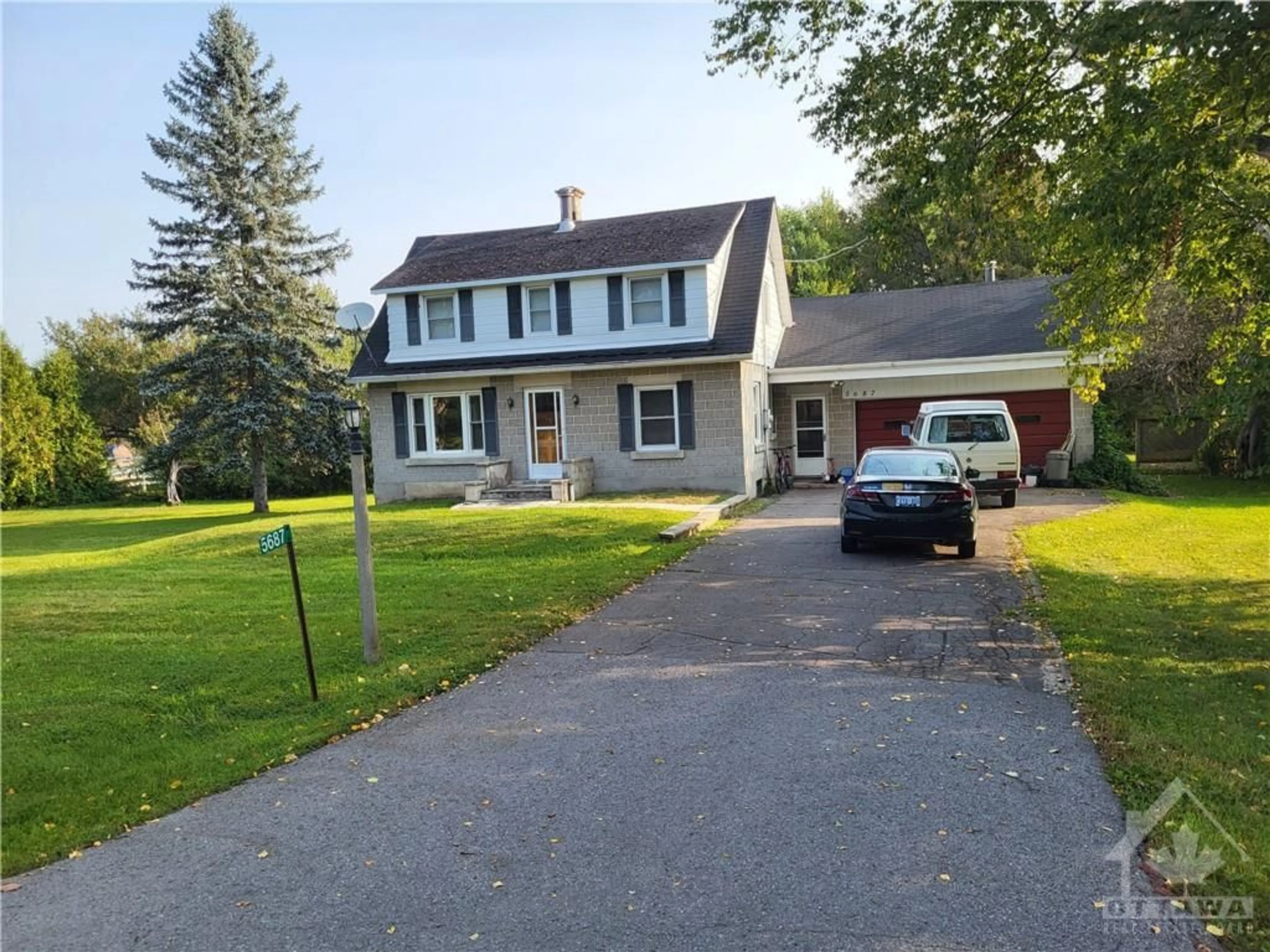 Frontside or backside of a home, the street view for 5687 FIRST LINE Rd, Manotick Ontario K0A 2E0