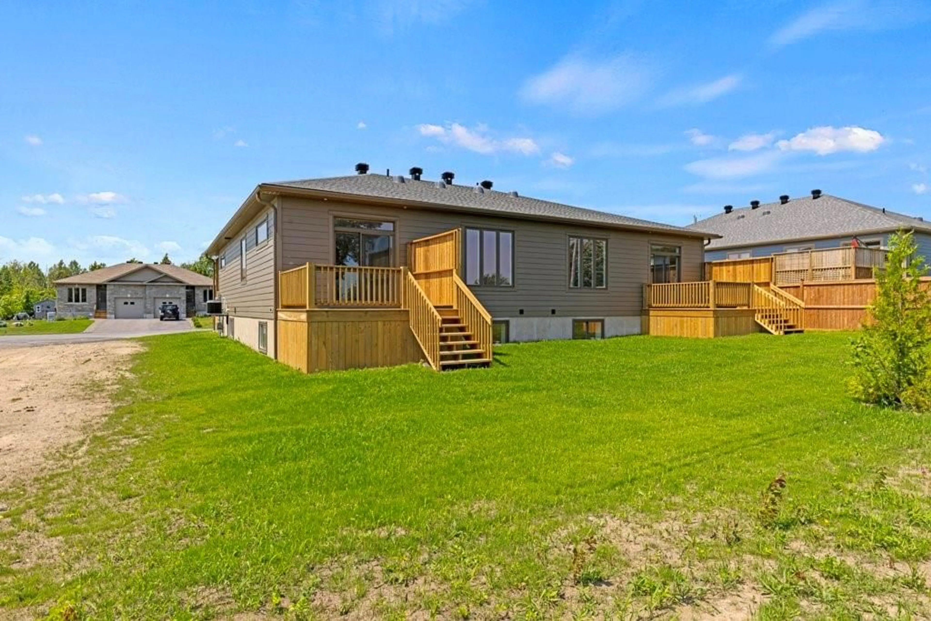 Frontside or backside of a home, the fenced backyard for 9 BILLINGS Ave, Iroquois Ontario K0E 1K0