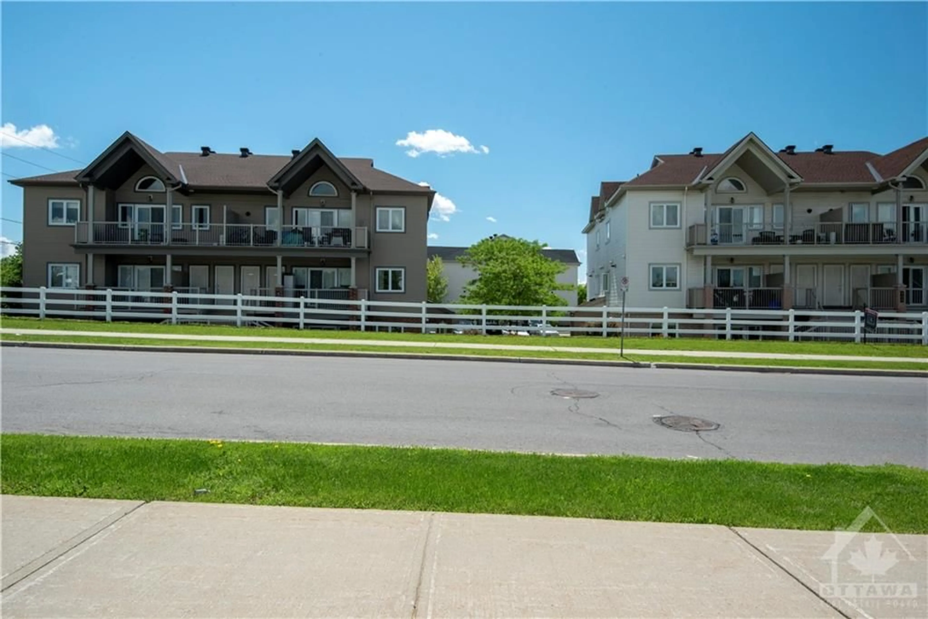 A pic from exterior of the house or condo, the street view for 900 WHITE ALDER Ave #A, Gloucester Ontario K1T 0K5