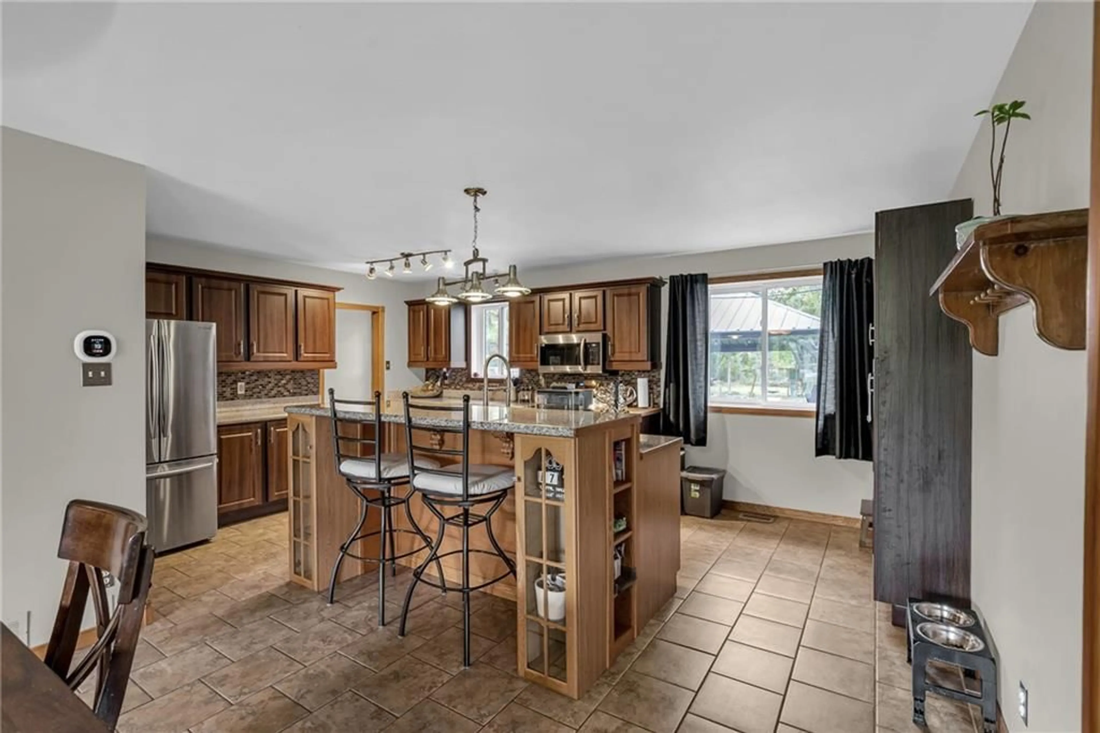 Open concept kitchen for 5400 COUNTY 12 Rd, Ingleside Ontario K0C 1M0