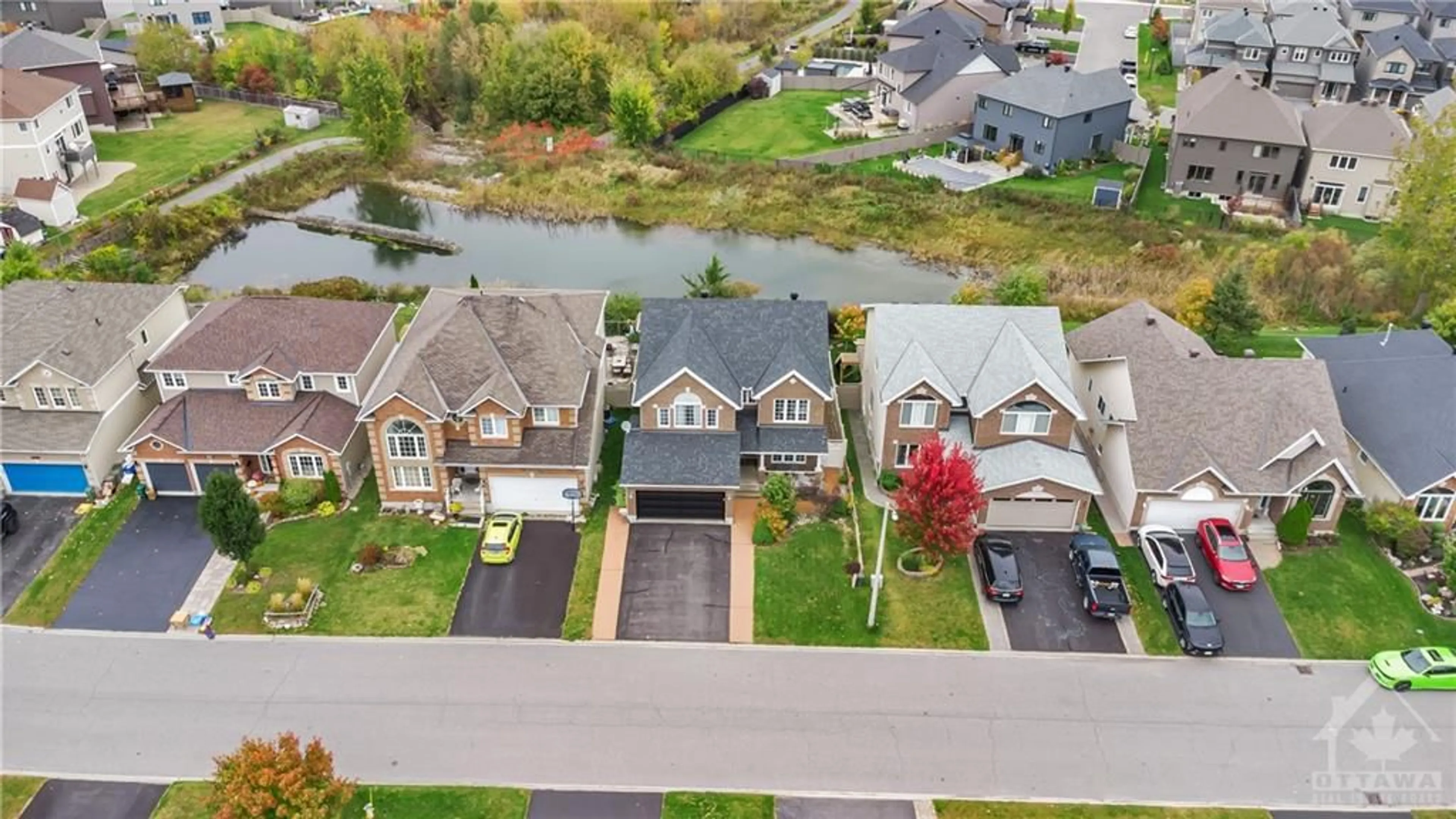 Frontside or backside of a home, the street view for 56 LLOYDALEX Cres, Ottawa Ontario K2S 2E8