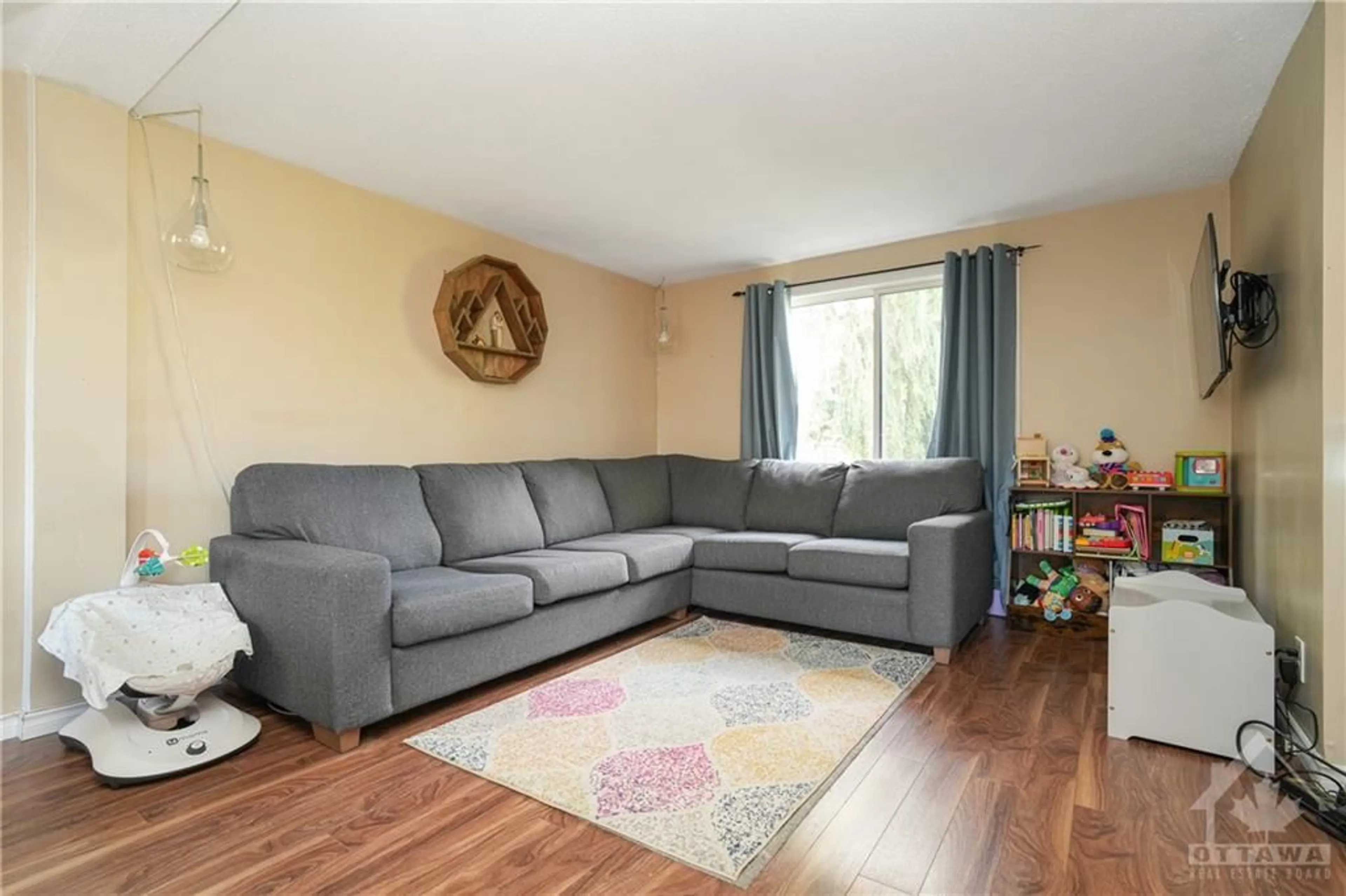 Living room, wood floors for 1510 BEAVERPOND Dr #B, Ottawa Ontario K1B 3R9