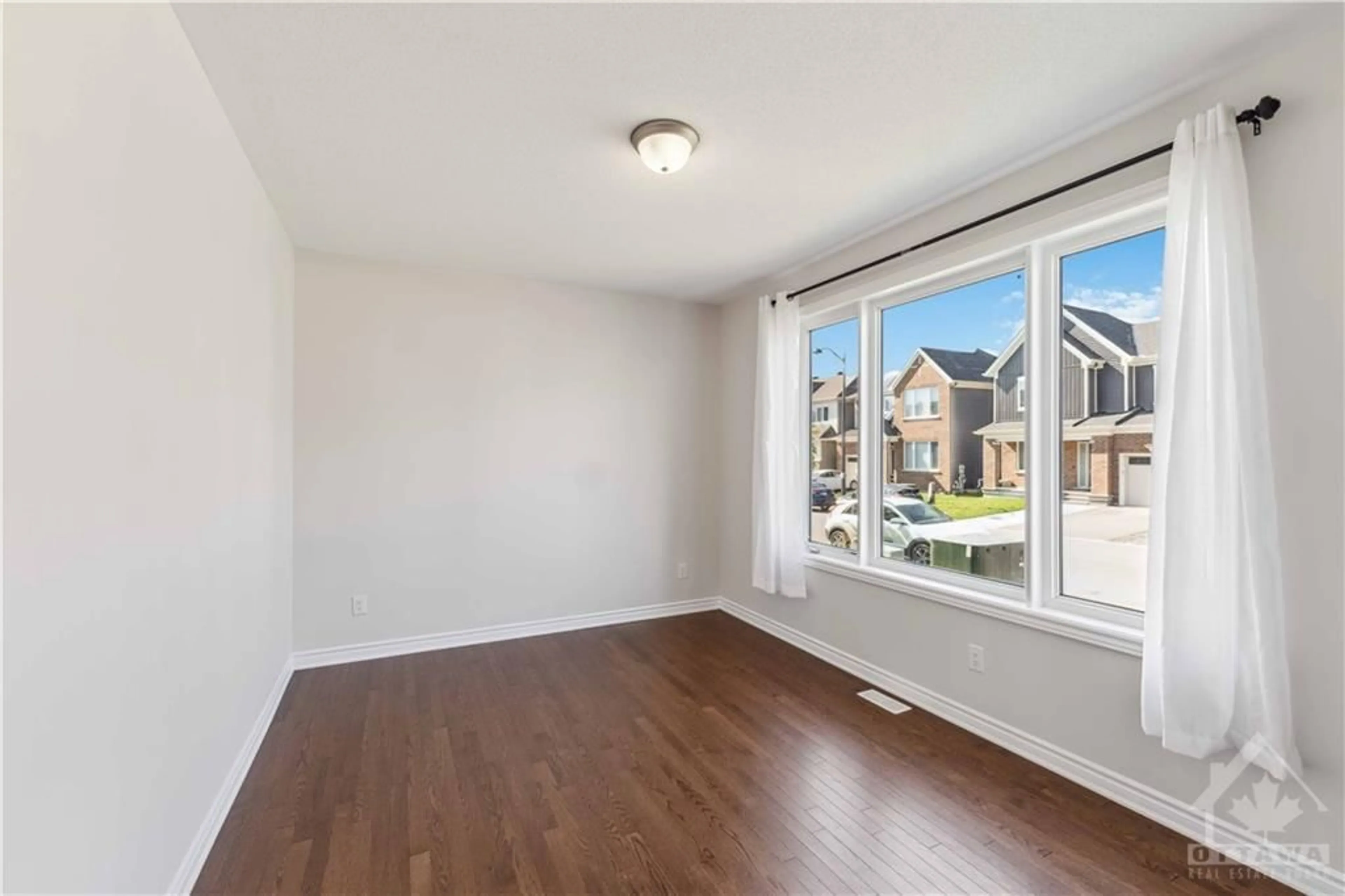 A pic of a room, wood floors for 752 VENNECY Terr, Orleans Ontario K1W 1H2