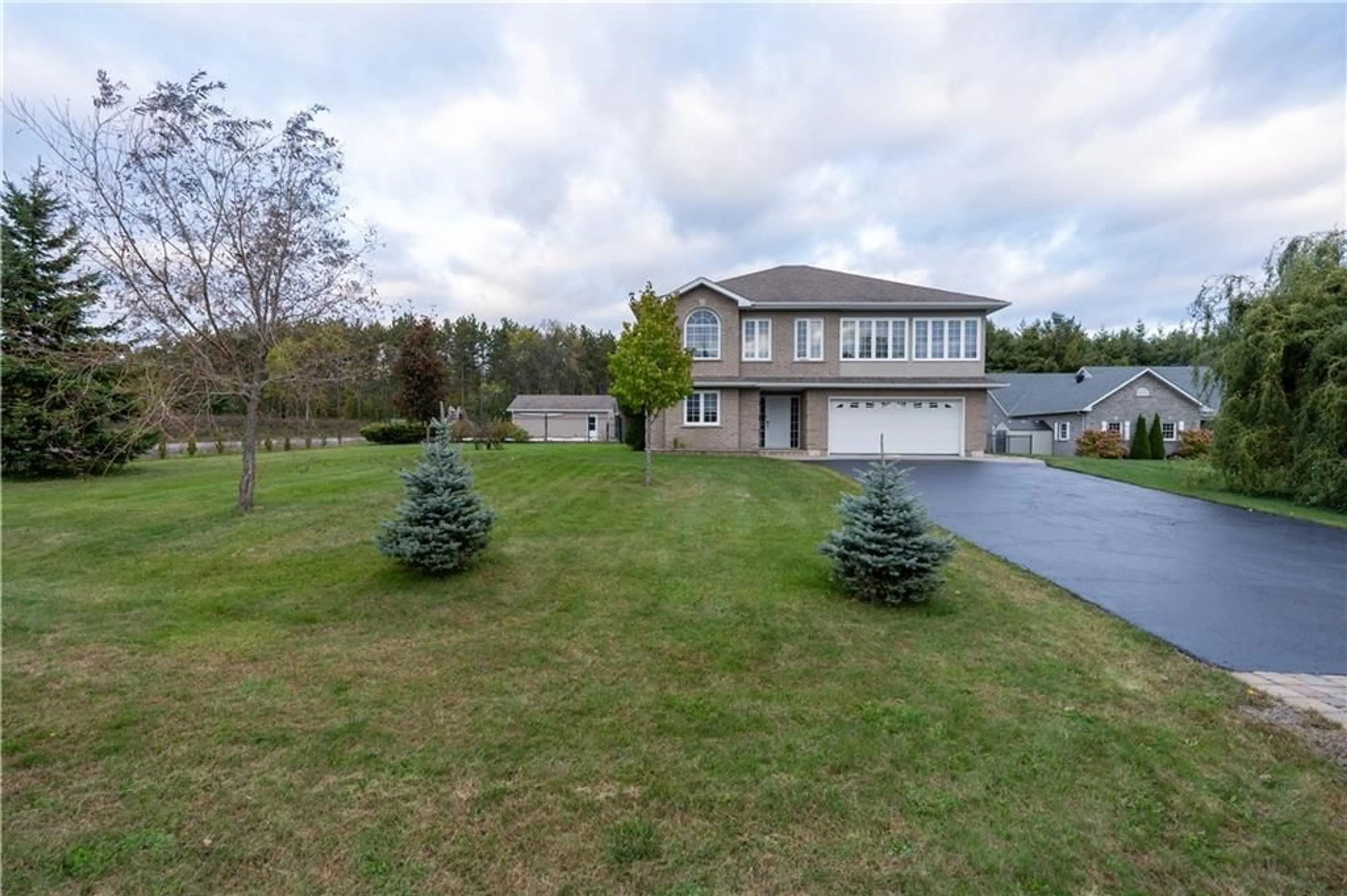 Frontside or backside of a home, the fenced backyard for 6547 SAPPHIRE Dr, Cornwall Ontario K6H 7J1