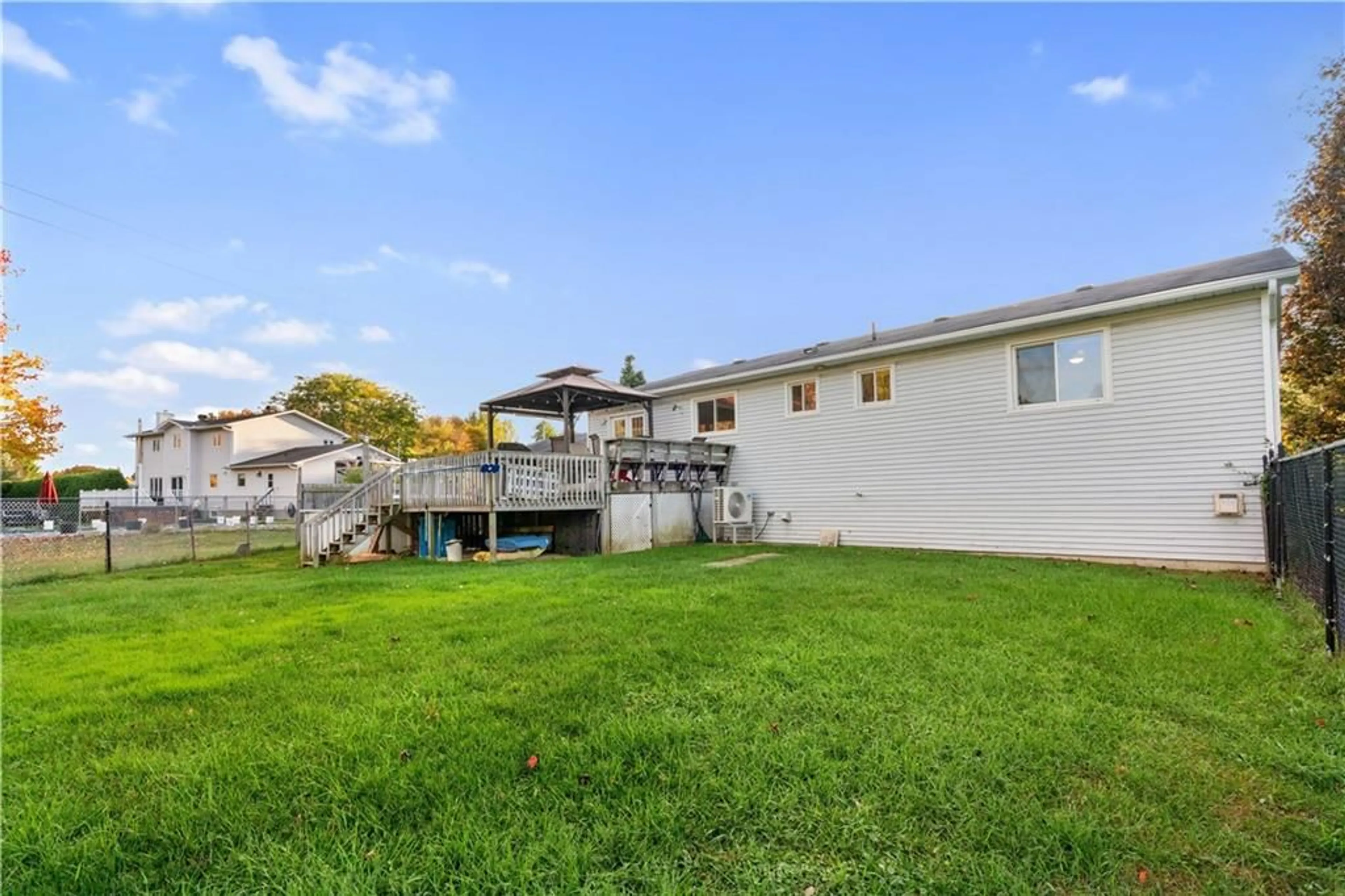 Frontside or backside of a home, the fenced backyard for 3307 PEARL St, Osgoode Ontario K0A 2W0