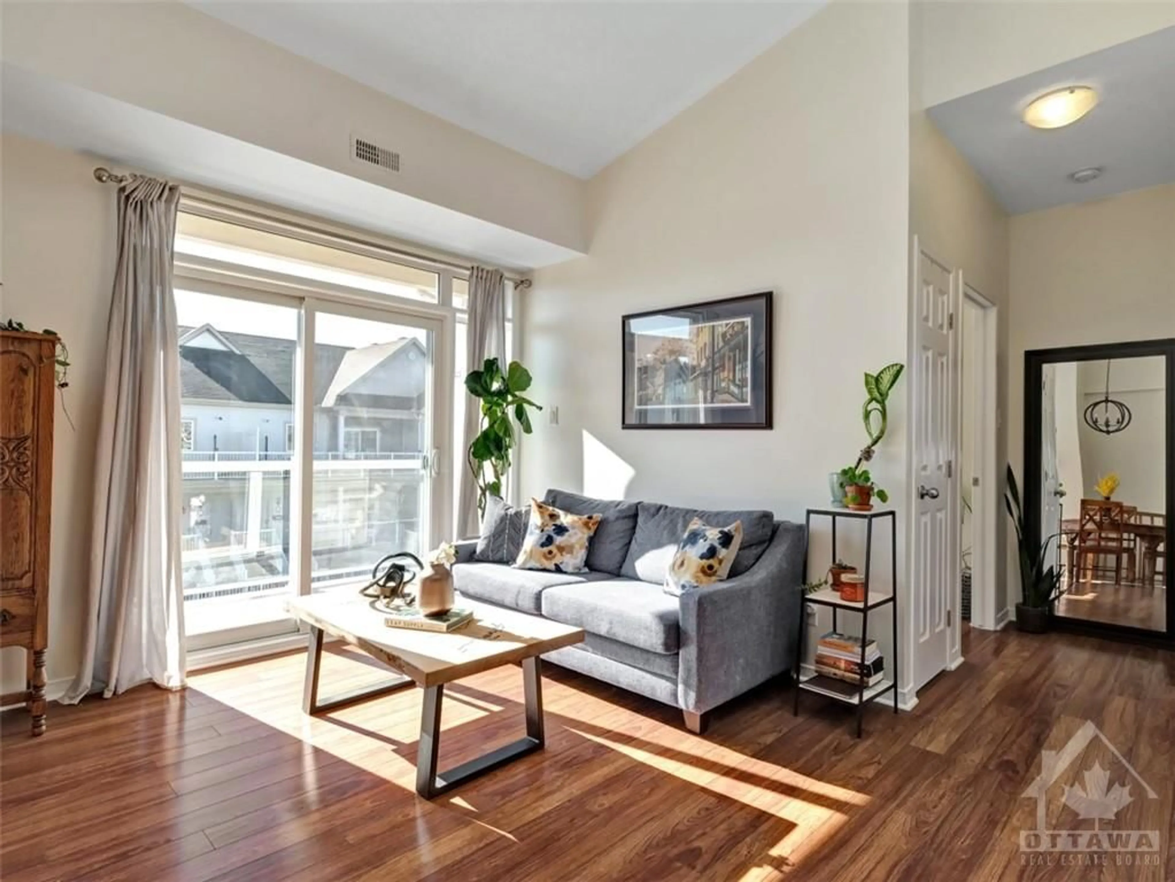 Living room, wood floors for 107 ARTESA Pvt #C, Ottawa Ontario K2S 0J8