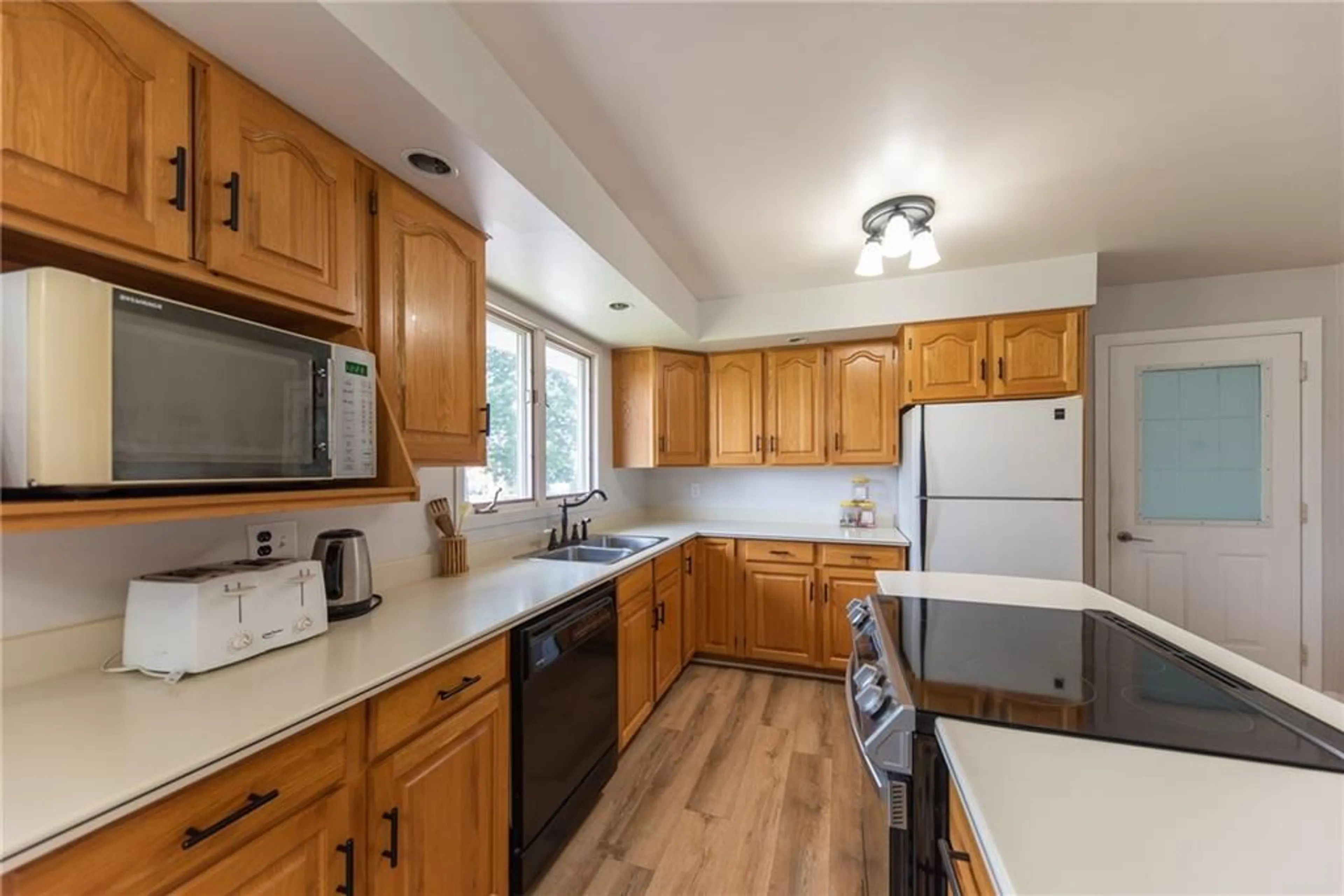 Standard kitchen, wood floors, cottage for 447 BOUNDARY Rd, Pembroke Ontario K8A 6L2