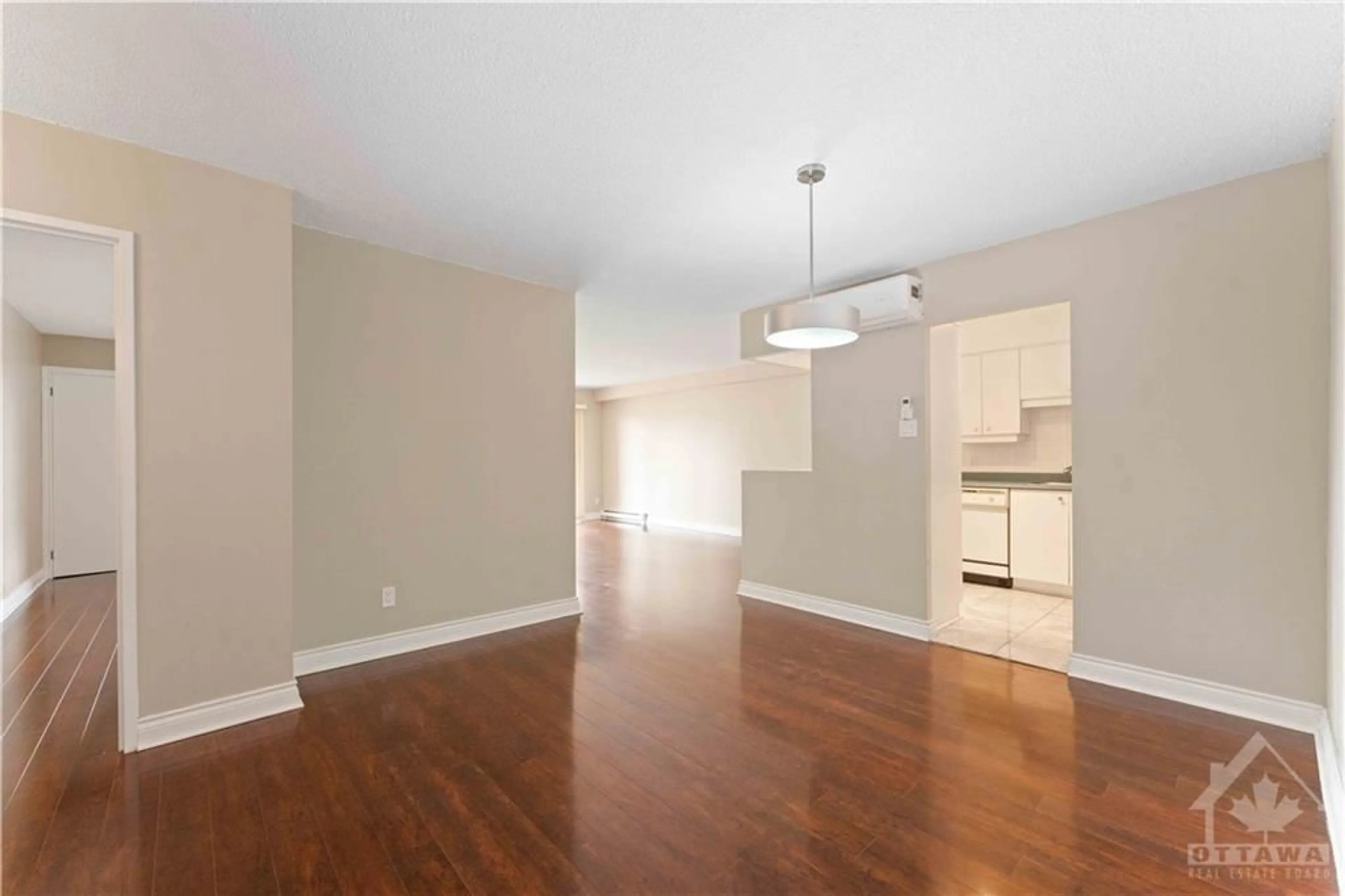 A pic of a room, wood floors for 158b MCARTHUR Ave #701, Ottawa Ontario K1L 8C9