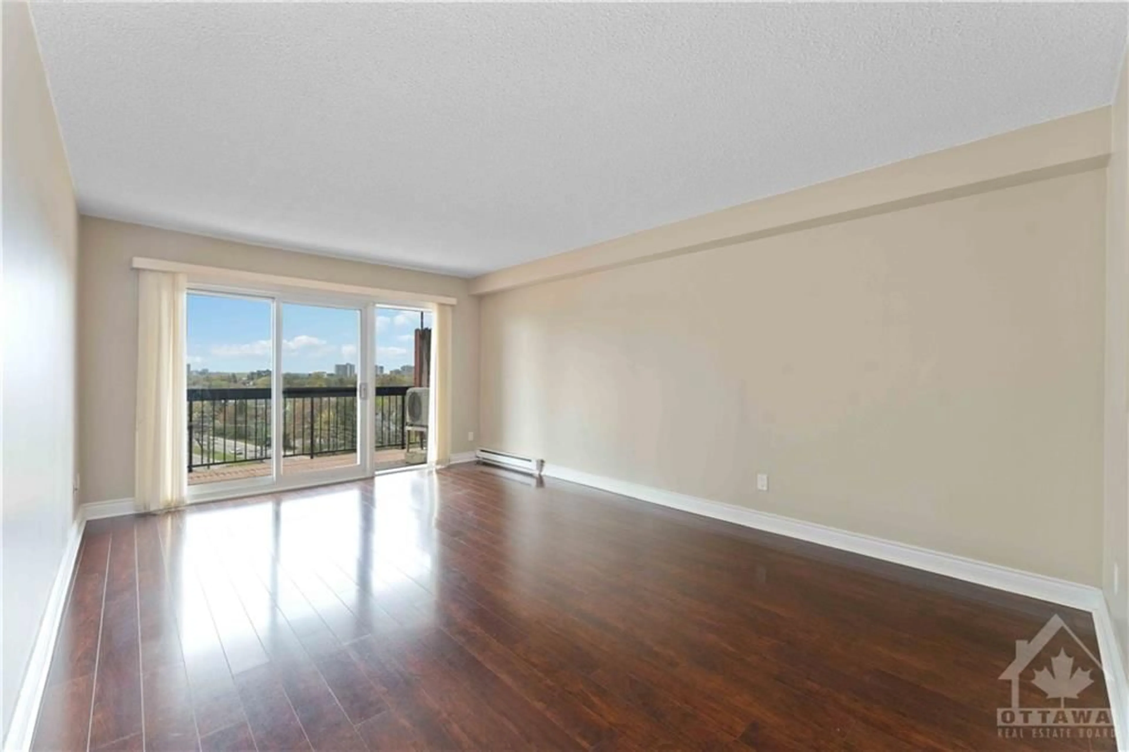 A pic of a room, wood floors for 158b MCARTHUR Ave #701, Ottawa Ontario K1L 8C9