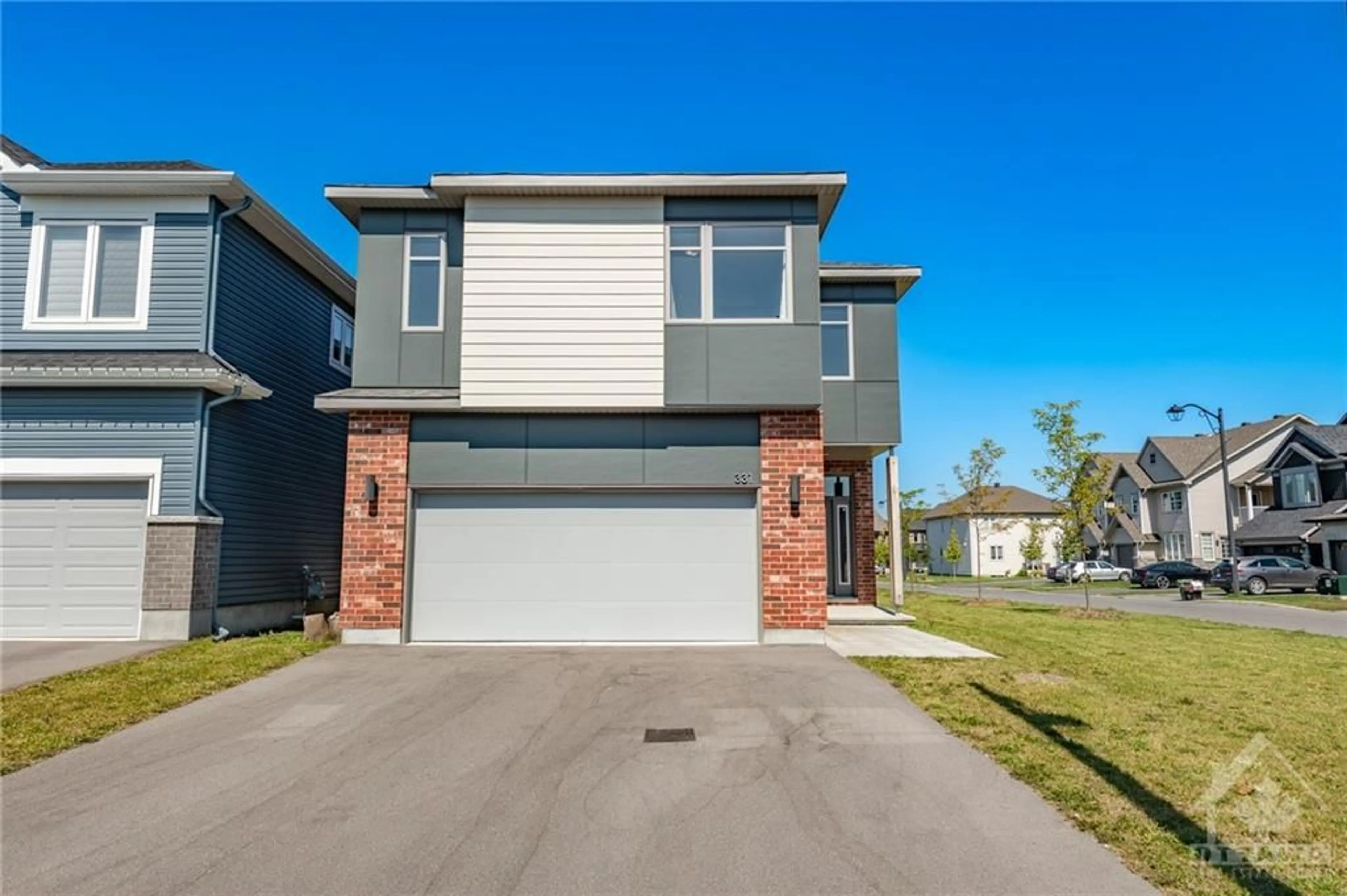 Frontside or backside of a home, the street view for 331 SPREADWING Way, Ottawa Ontario K1X 0J5