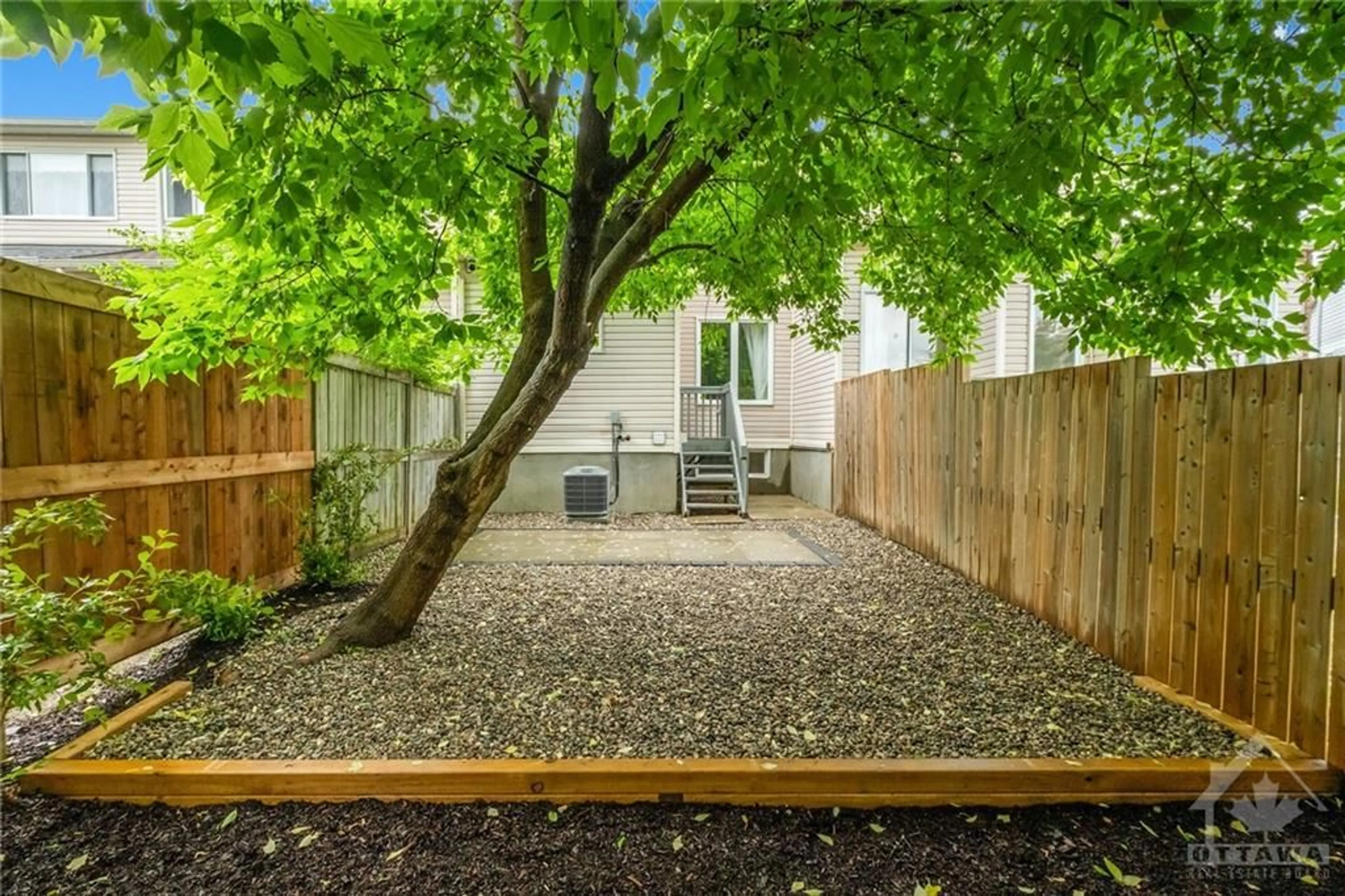 Patio, the fenced backyard for 54 MARGRAVE Ave, Ottawa Ontario K1T 3Y1