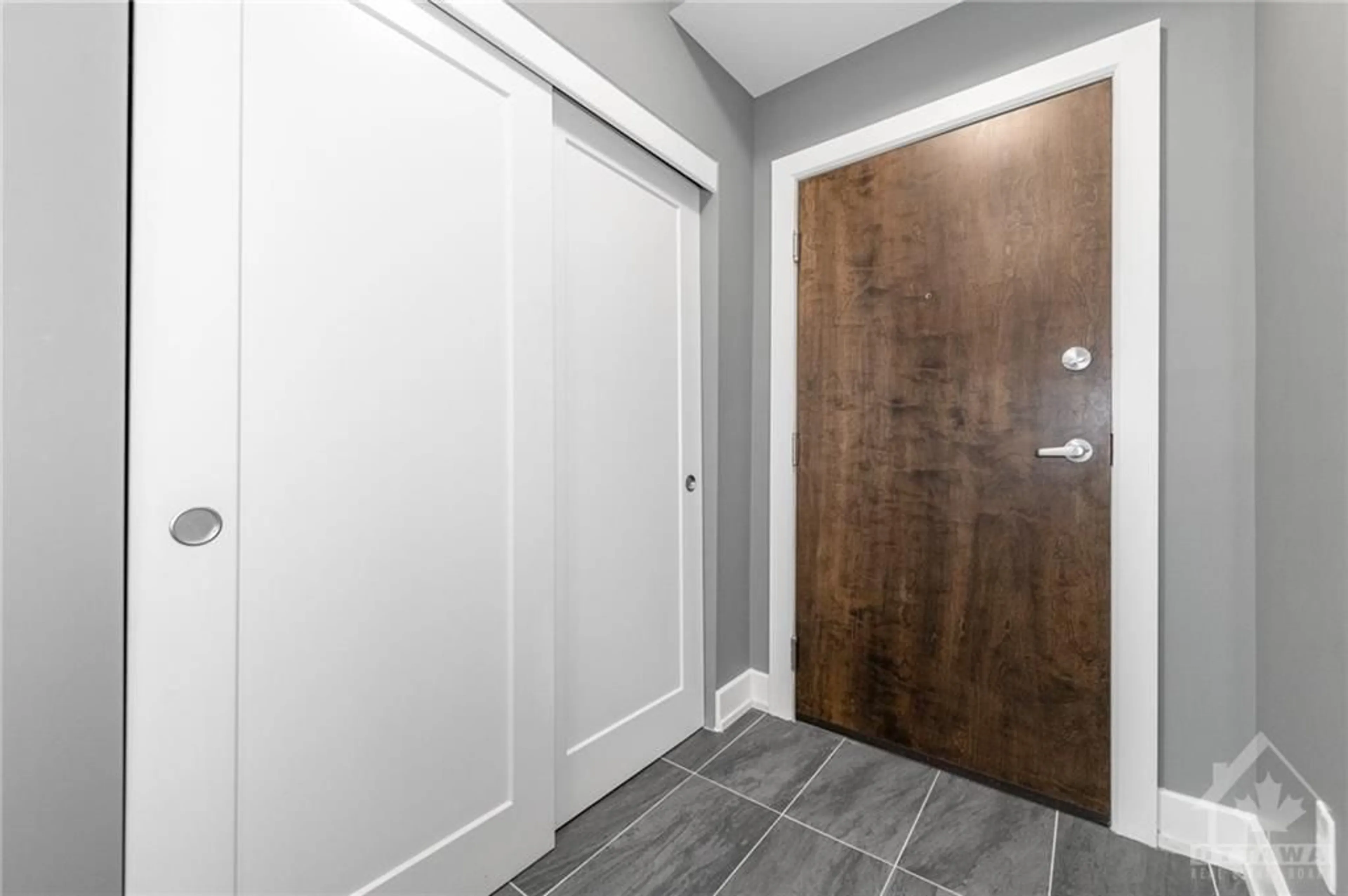 Indoor entryway, wood floors for 615 LONGFIELDS Dr #203, Ottawa Ontario K2J 6J3