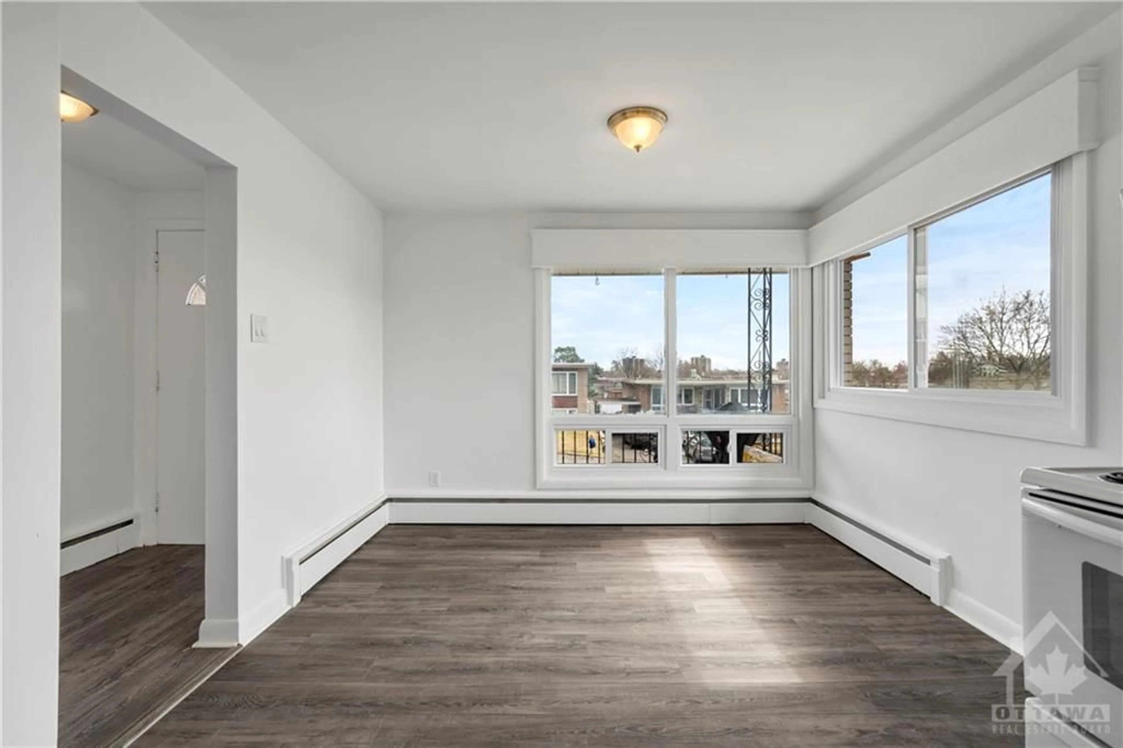 A pic of a room, wood floors for 267 MICHEL Cir, Ottawa Ontario K1L 7P4