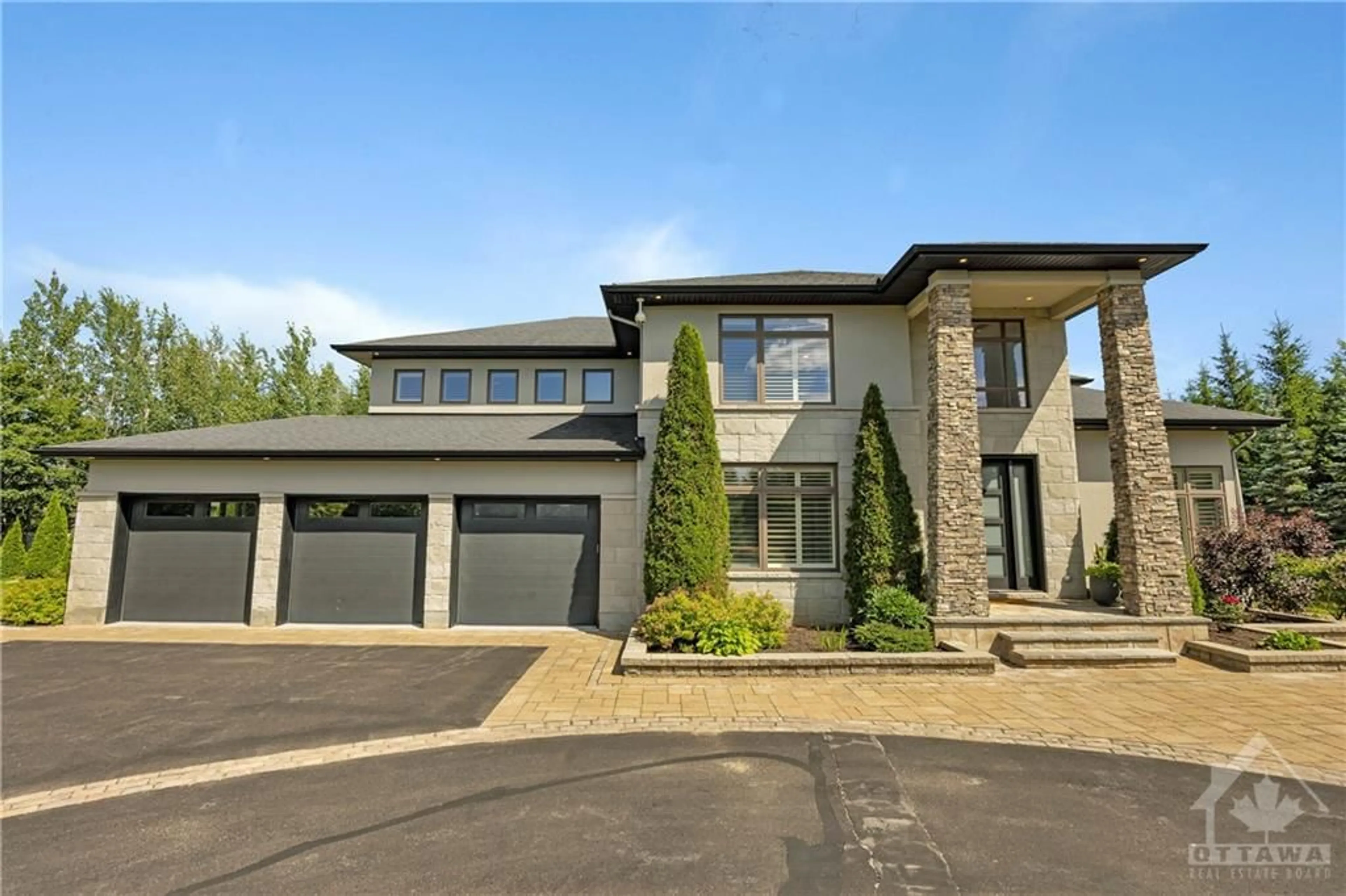 Frontside or backside of a home, the street view for 1282 JESTER Crt, Manotick Ontario K4M 0A2