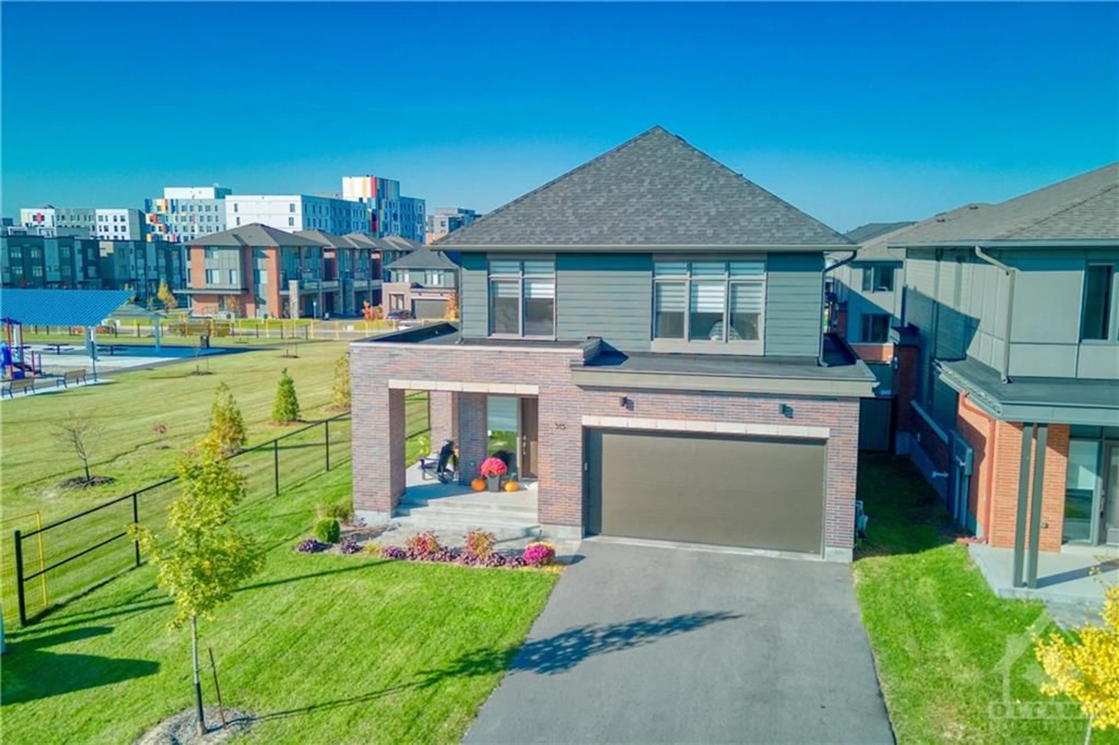 Frontside or backside of a home, the fenced backyard for 315 WIGWAS St, Ottawa Ontario K1K 5A1