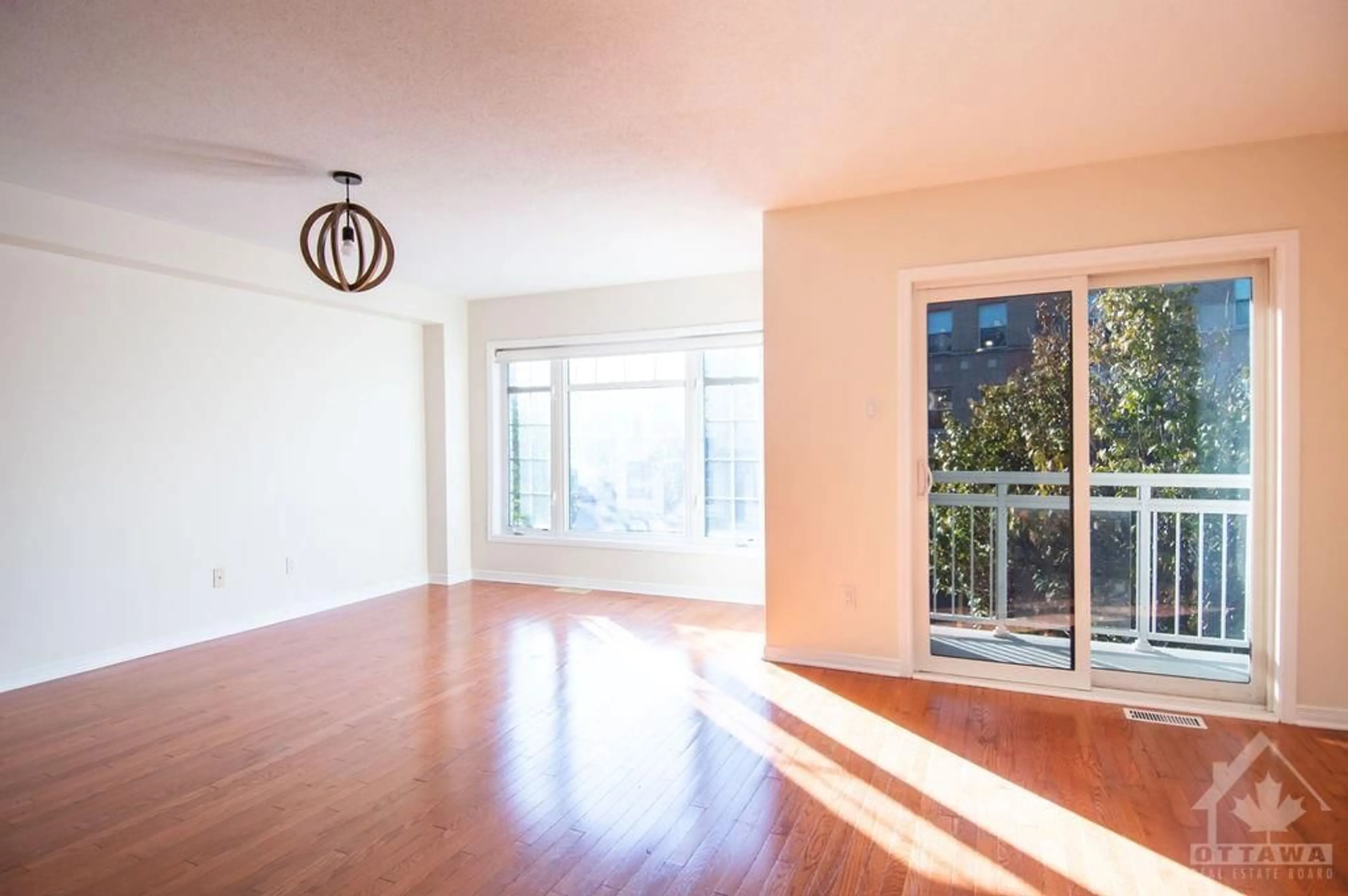 A pic of a room, wood floors for 133 CORINTH Pvt, Ottawa Ontario K2E 0A8