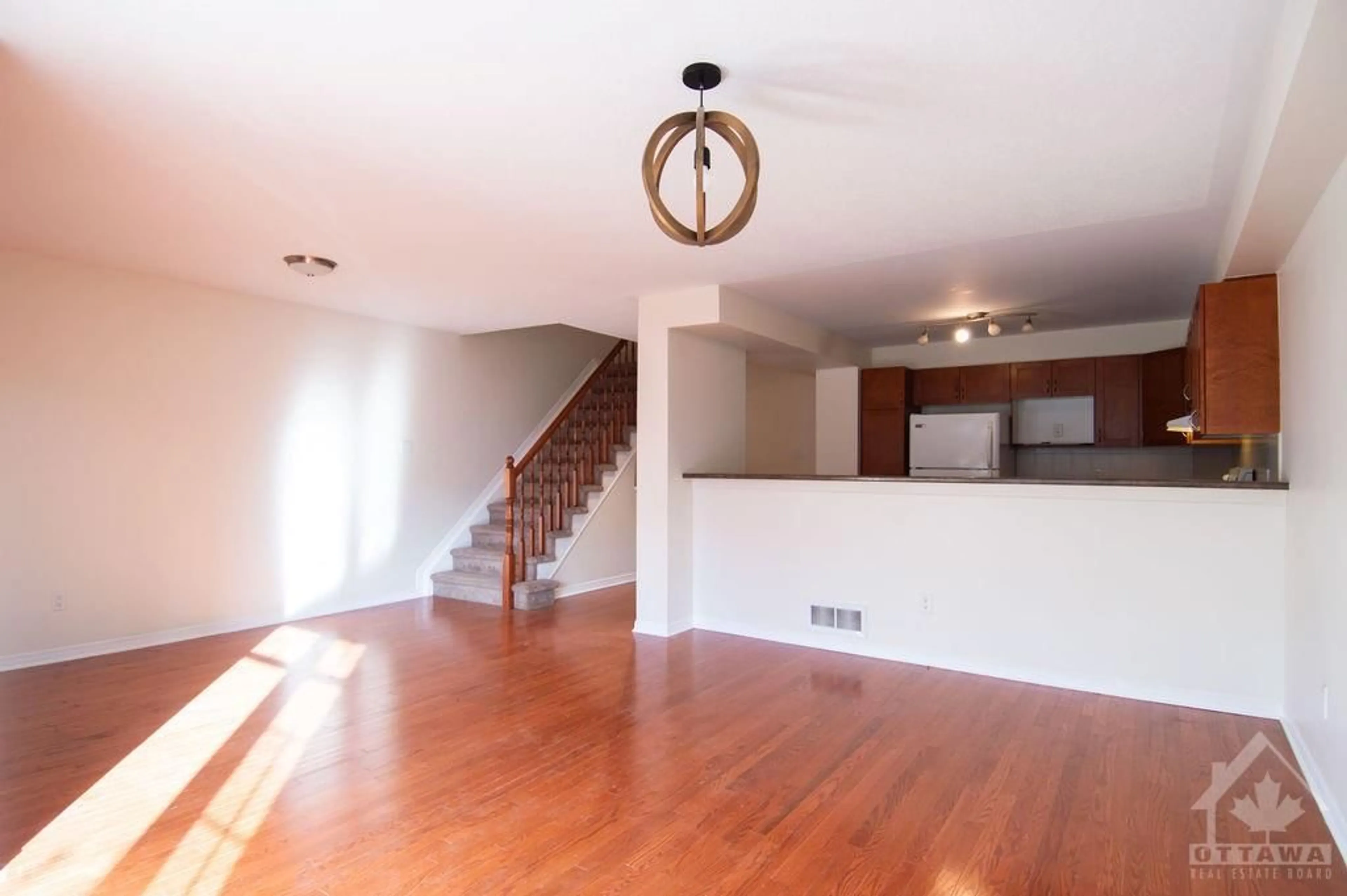 A pic of a room, wood floors for 133 CORINTH Pvt, Ottawa Ontario K2E 0A8