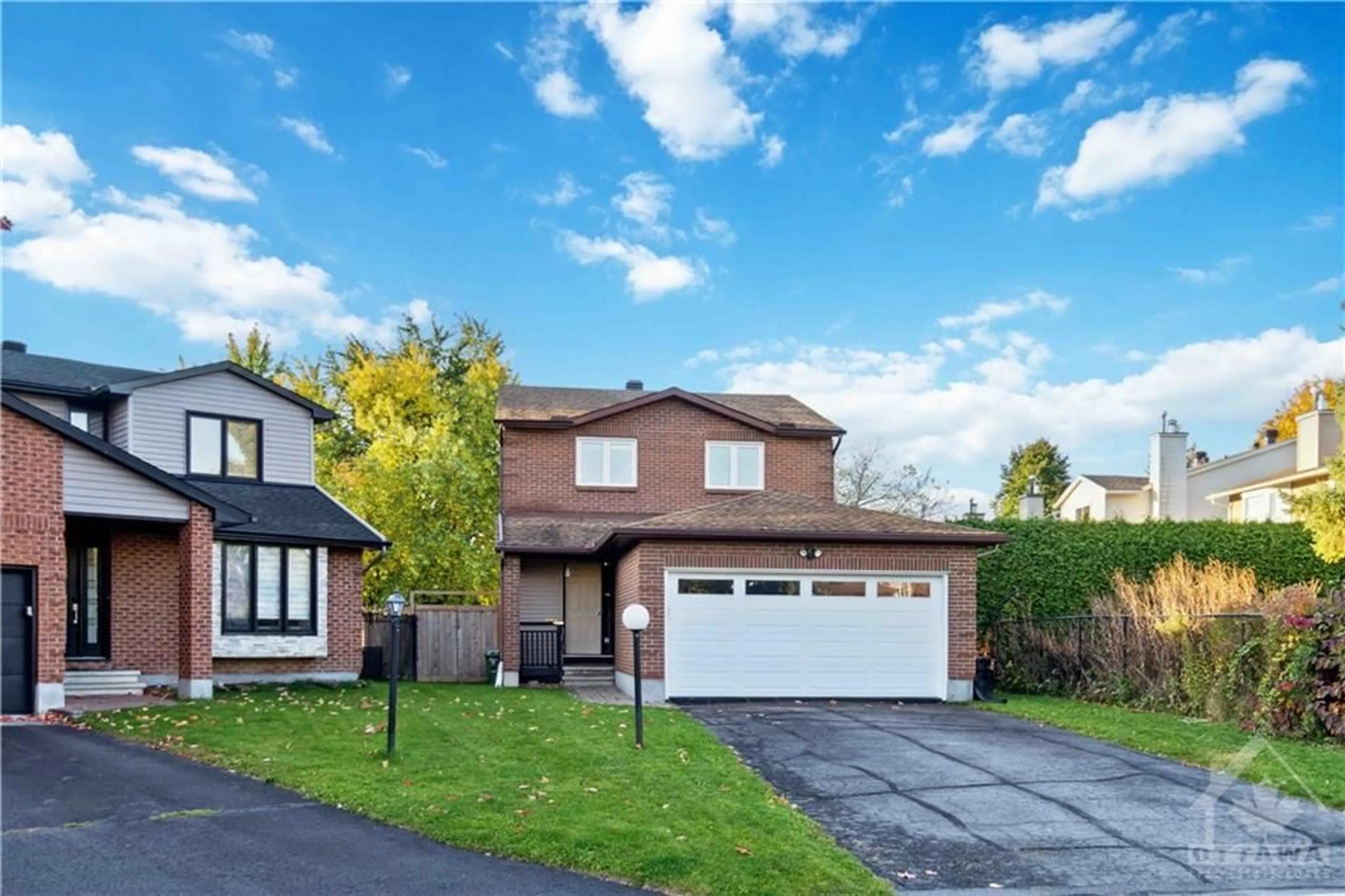 Frontside or backside of a home, the fenced backyard for 6 SHADETREE Cres, Ottawa Ontario K2E 7R2