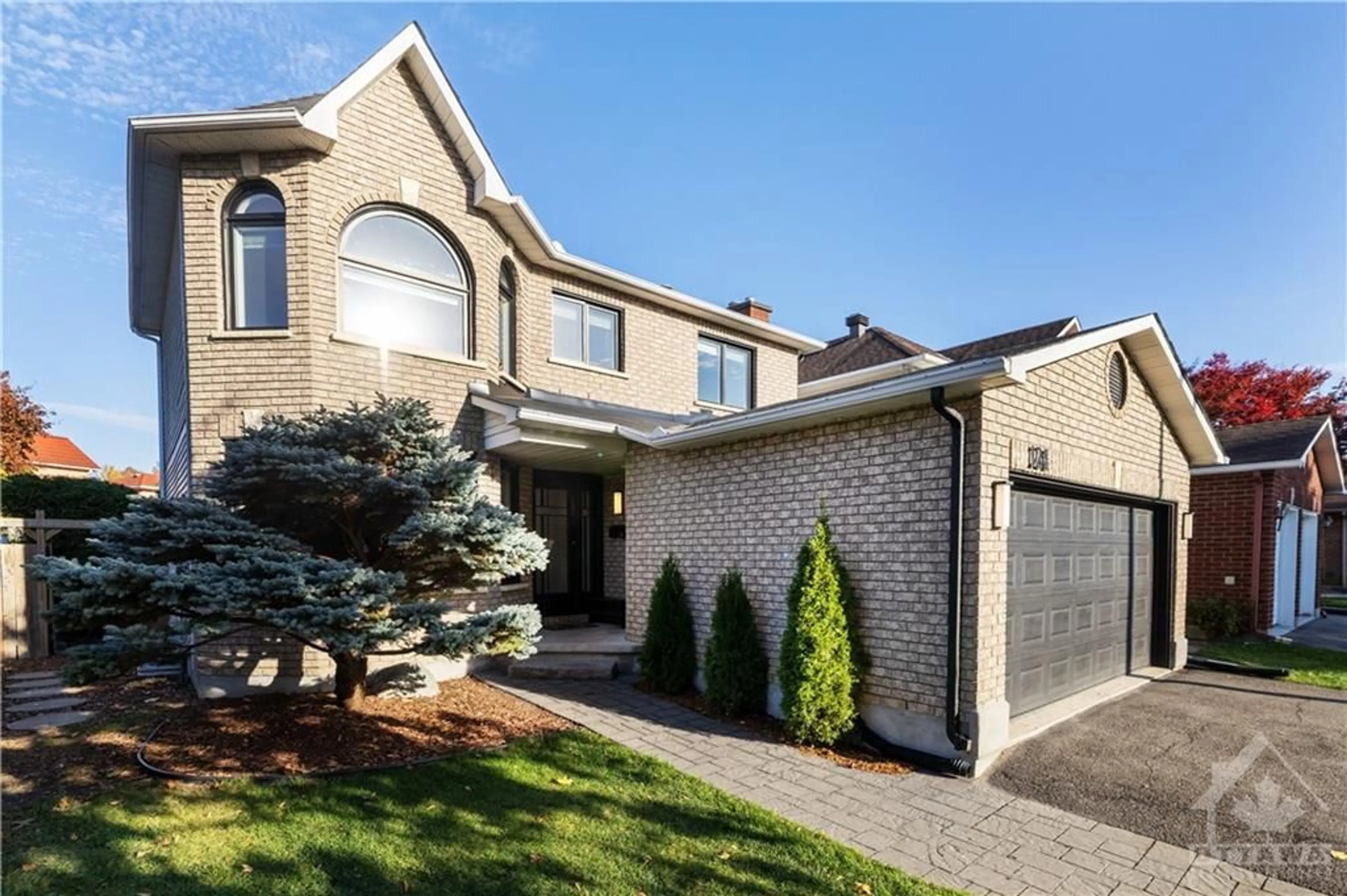 Home with brick exterior material for 124 SAI Cres, Ottawa Ontario K1G 5P1