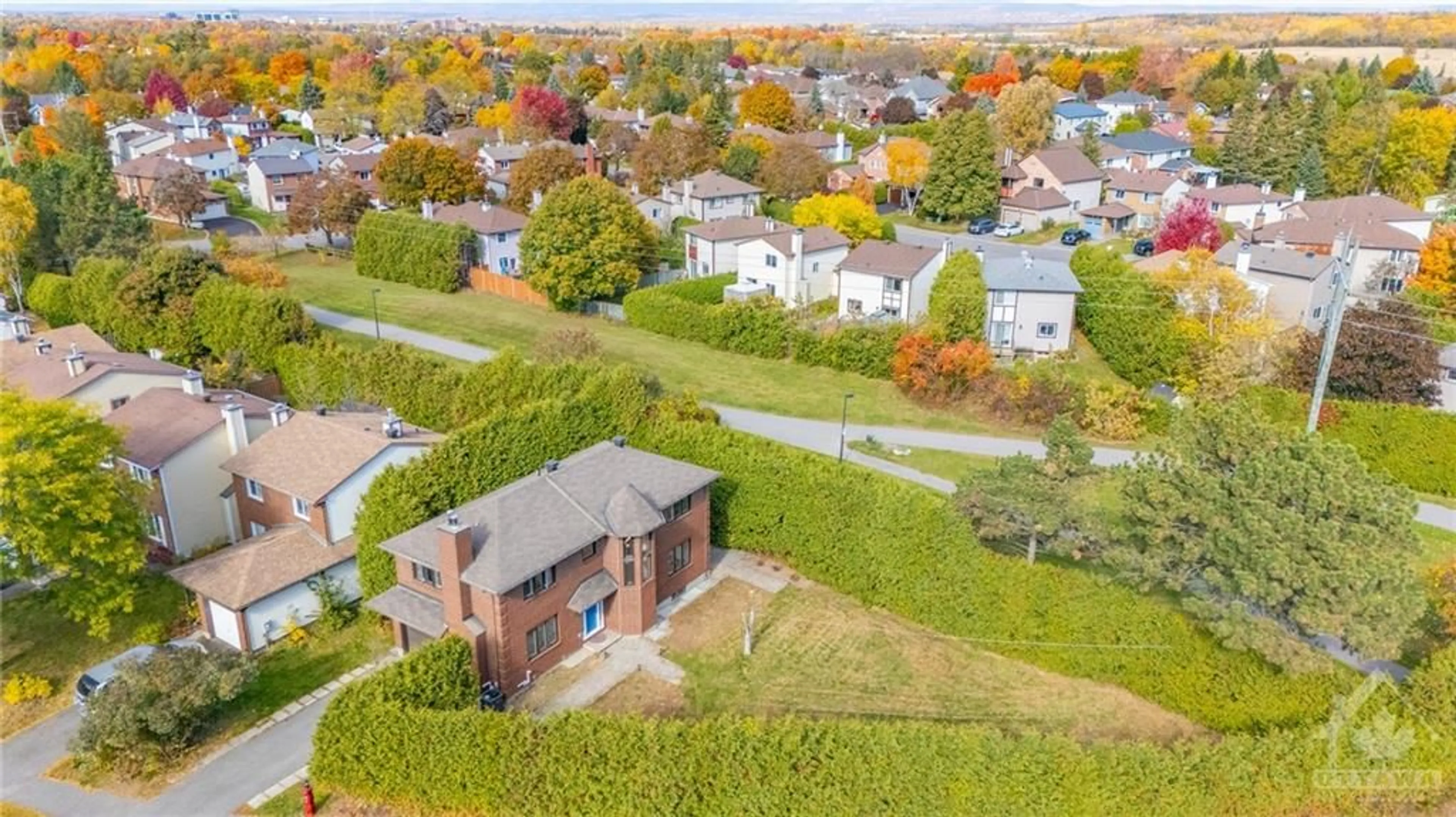 A pic from exterior of the house or condo, the fenced backyard for 366 PICKFORD Dr, Ottawa Ontario K2L 3P1