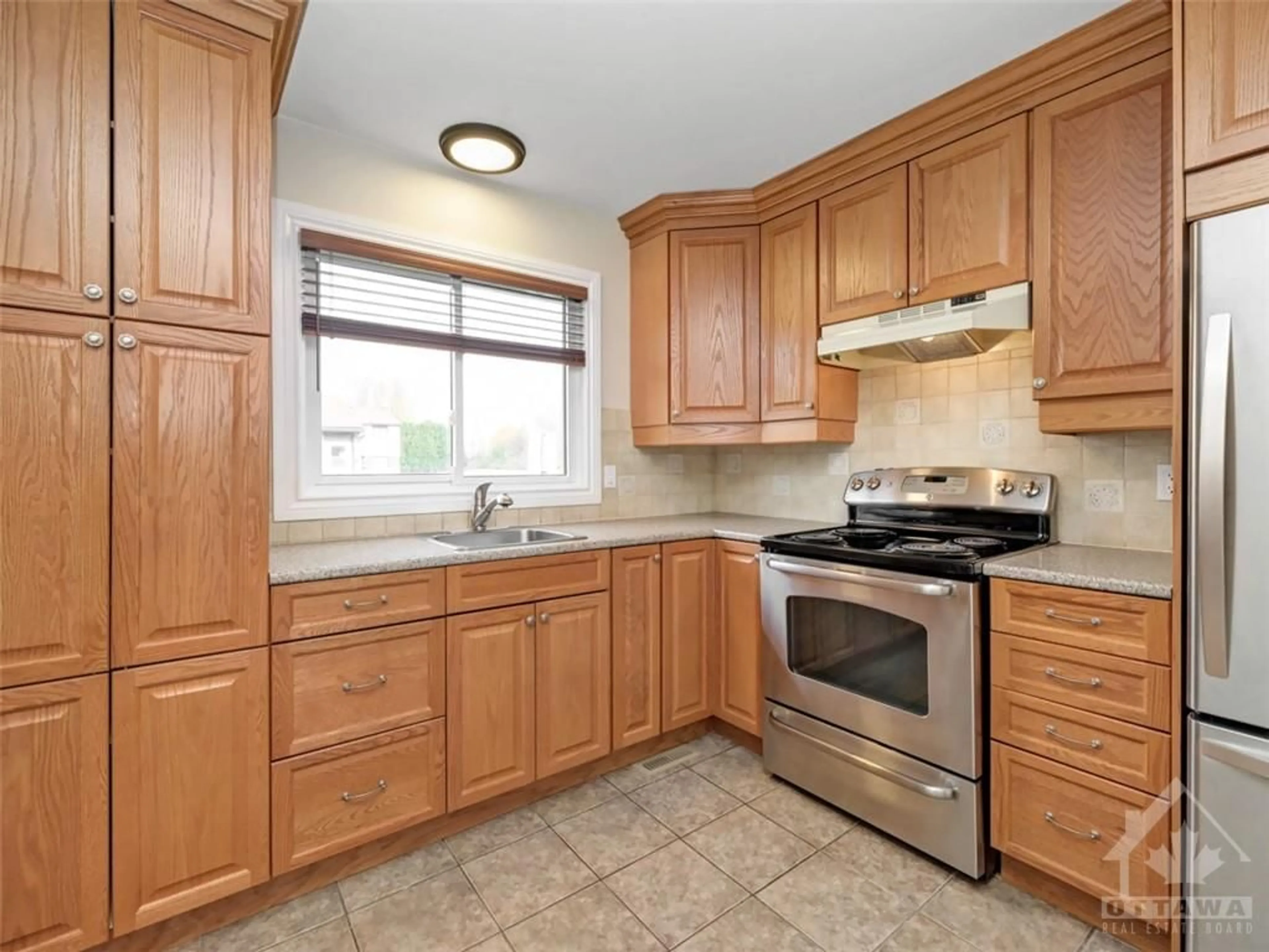 Standard kitchen, wood floors for 15 FOXHILL Way #A, Ottawa Ontario K2J 1P3