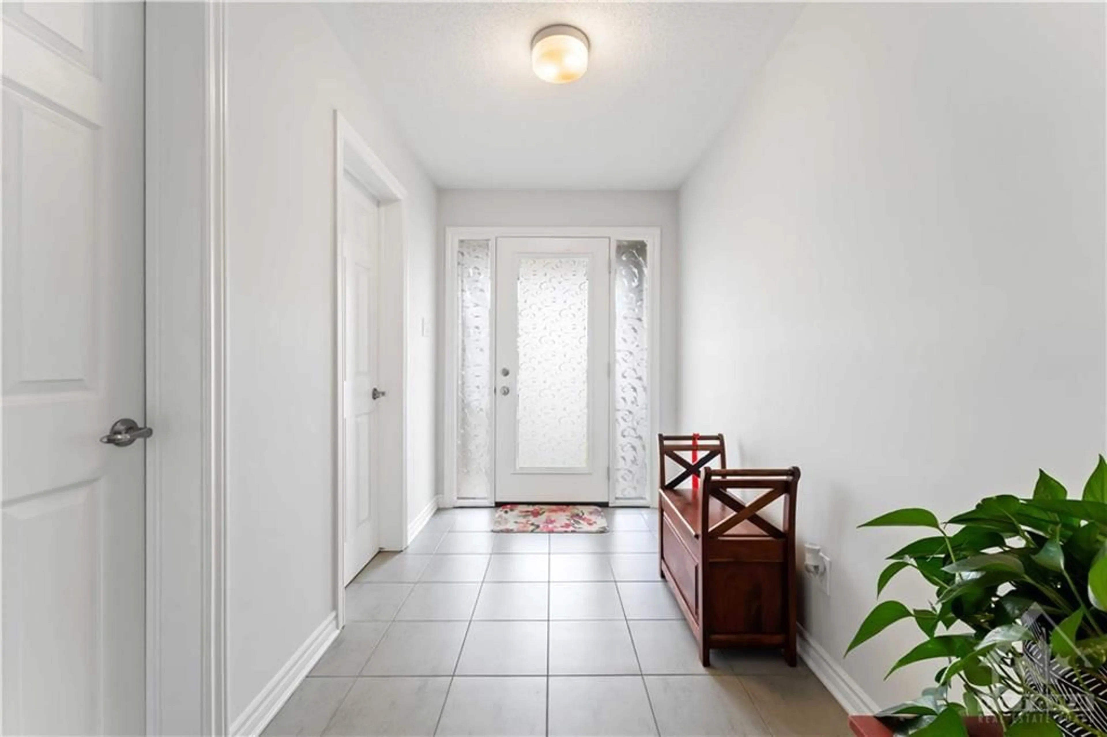 Indoor entryway, wood floors for 612 RYE GRASS Way, Ottawa Ontario K2J 6Z9