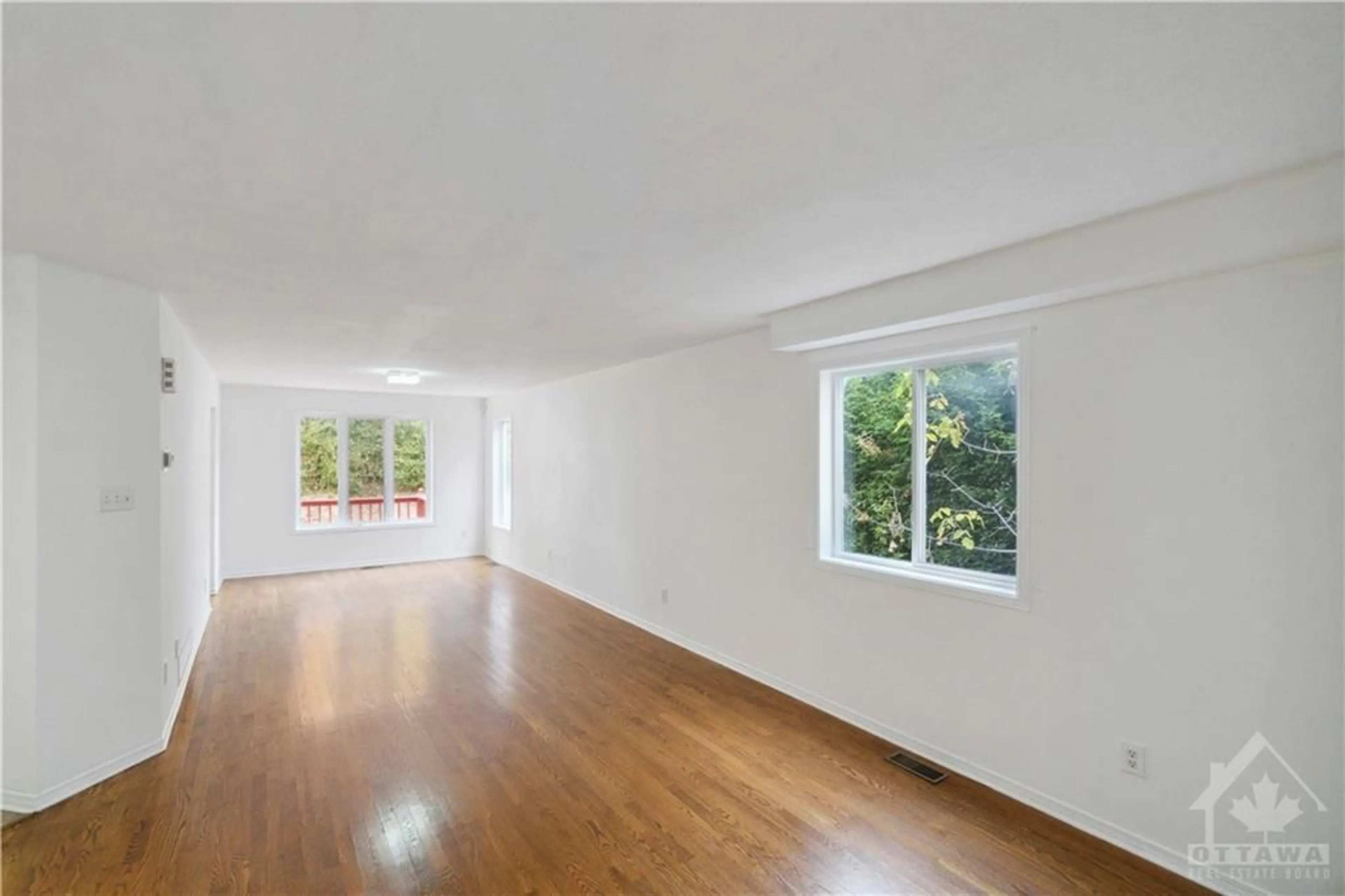 A pic of a room, wood floors for 144 CARWOOD Cir, Ottawa Ontario K1K 4V3